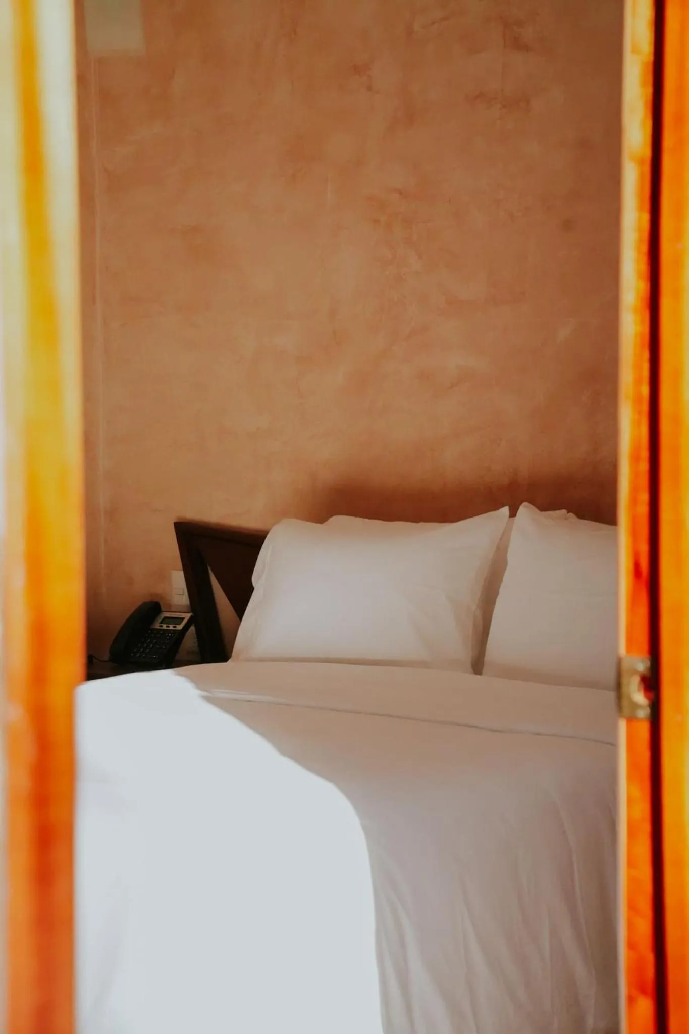 Bed in Hacienda Cenote San Ignacio
