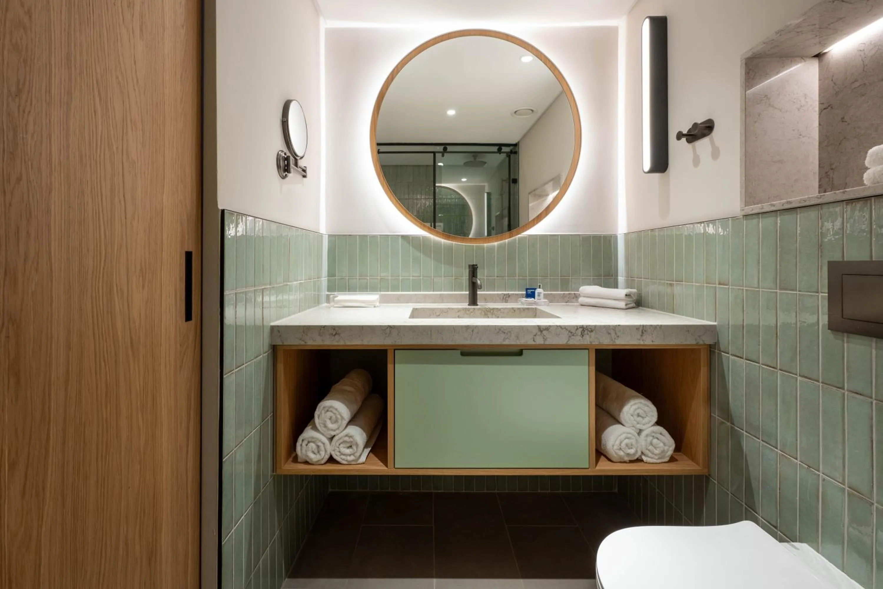 Bathroom in Sport Club by Isrotel Collection