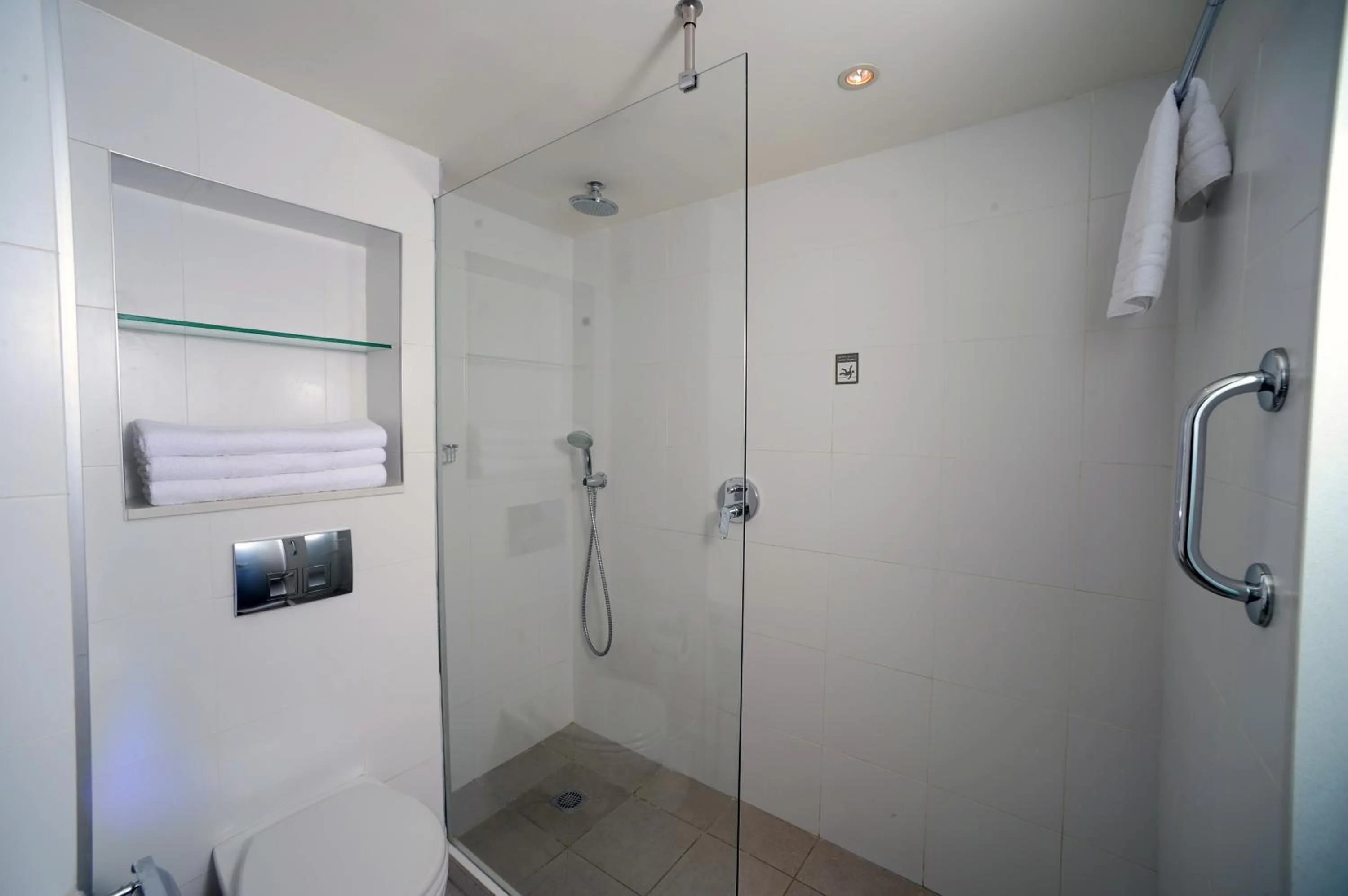 Bathroom in Sport Club by Isrotel Collection