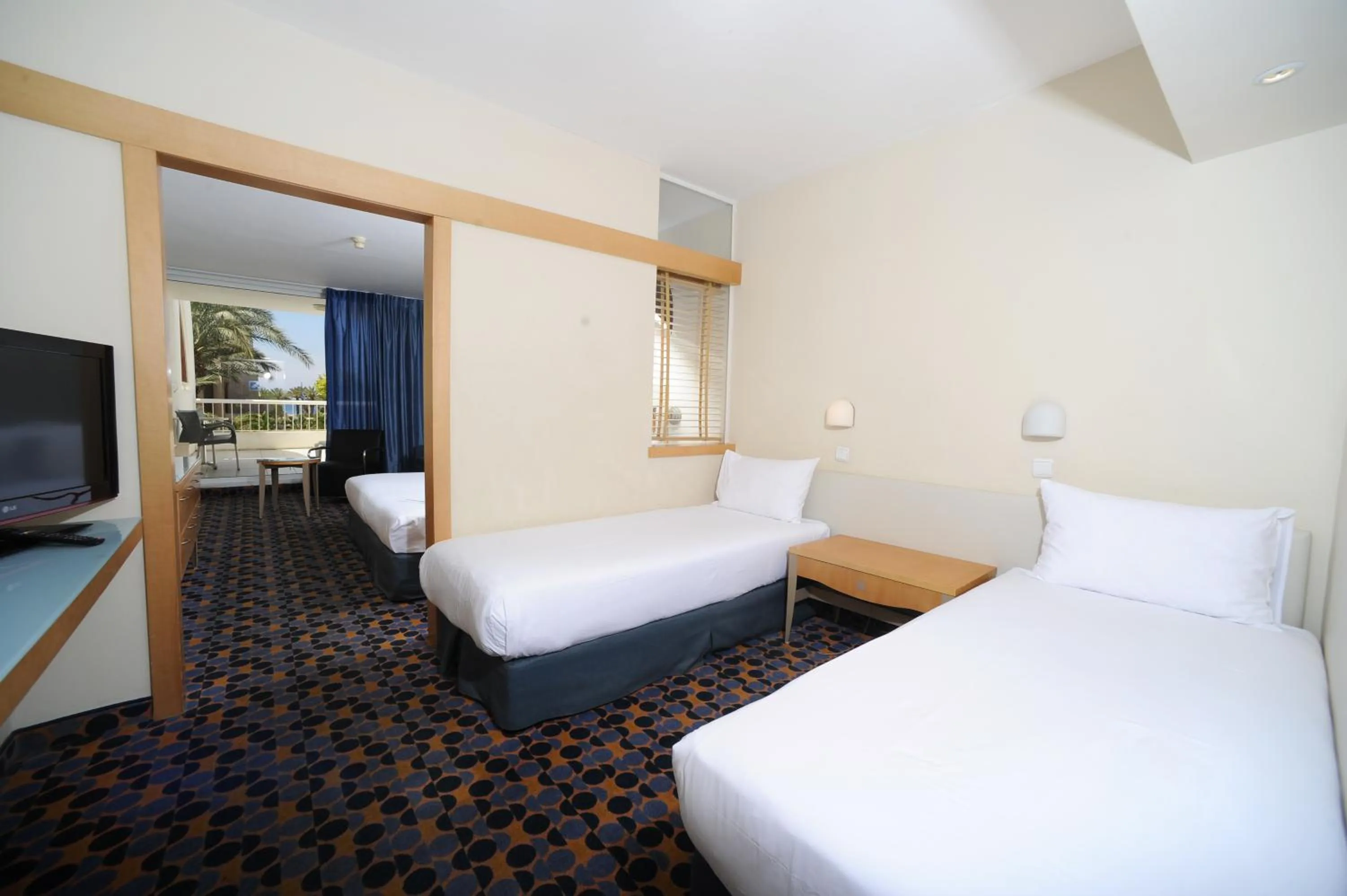 Bed in Sport Club by Isrotel Collection