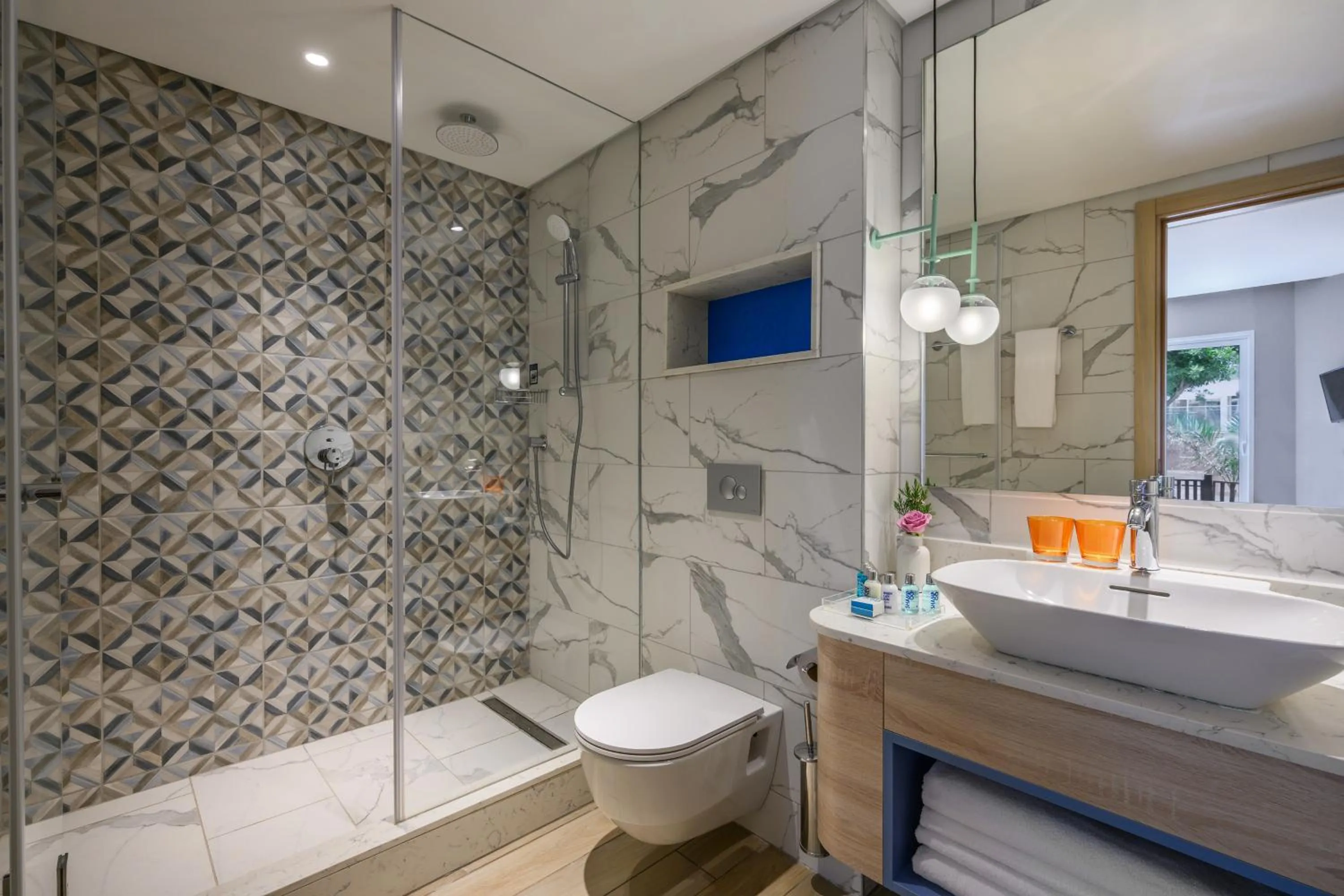 Bathroom in Royal Garden by Isrotel Collection