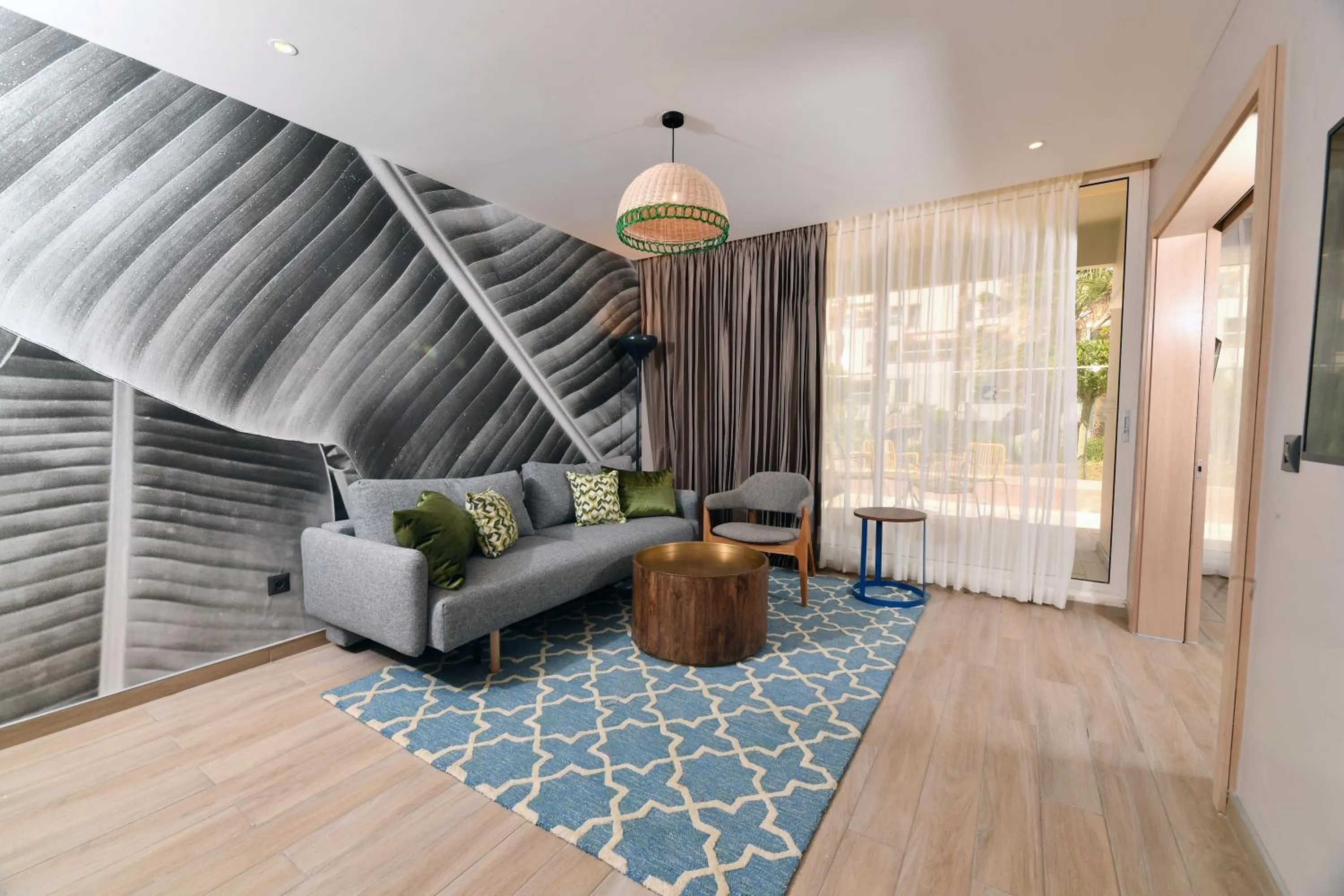 Living room in Royal Garden by Isrotel Collection