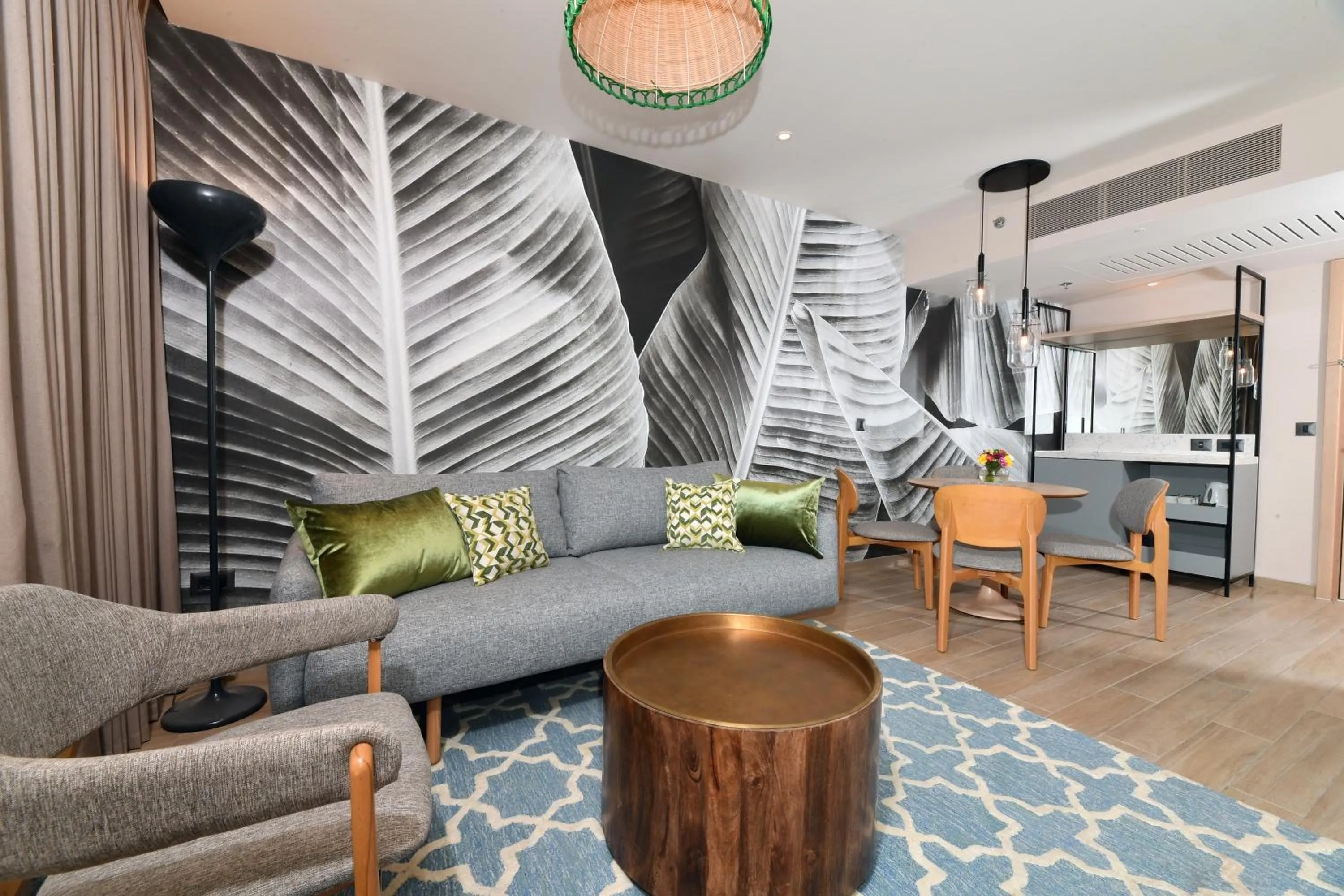 Living room in Royal Garden by Isrotel Collection