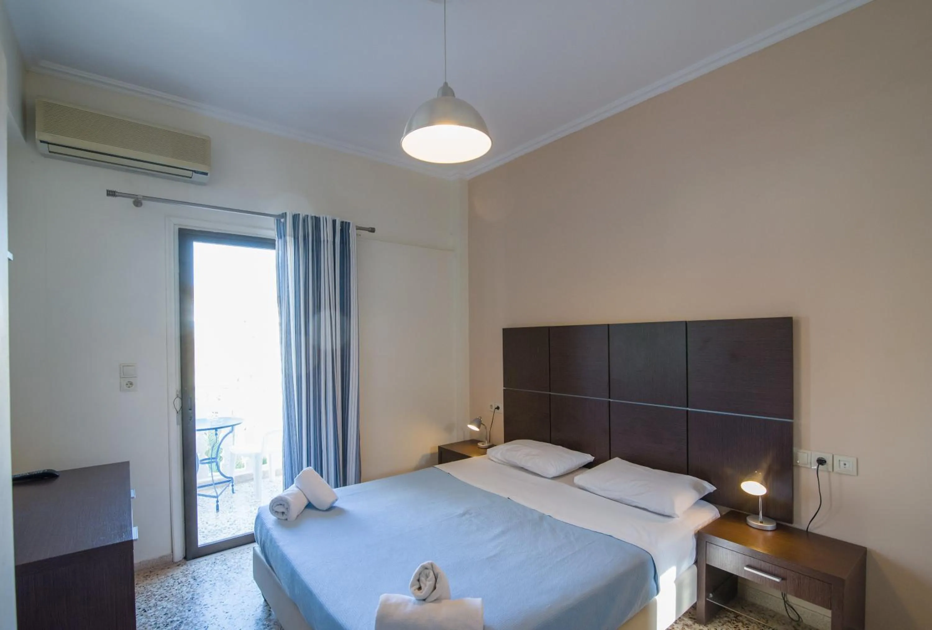 Photo of the whole room, Bed in Kamari Blue Boutique Hotel