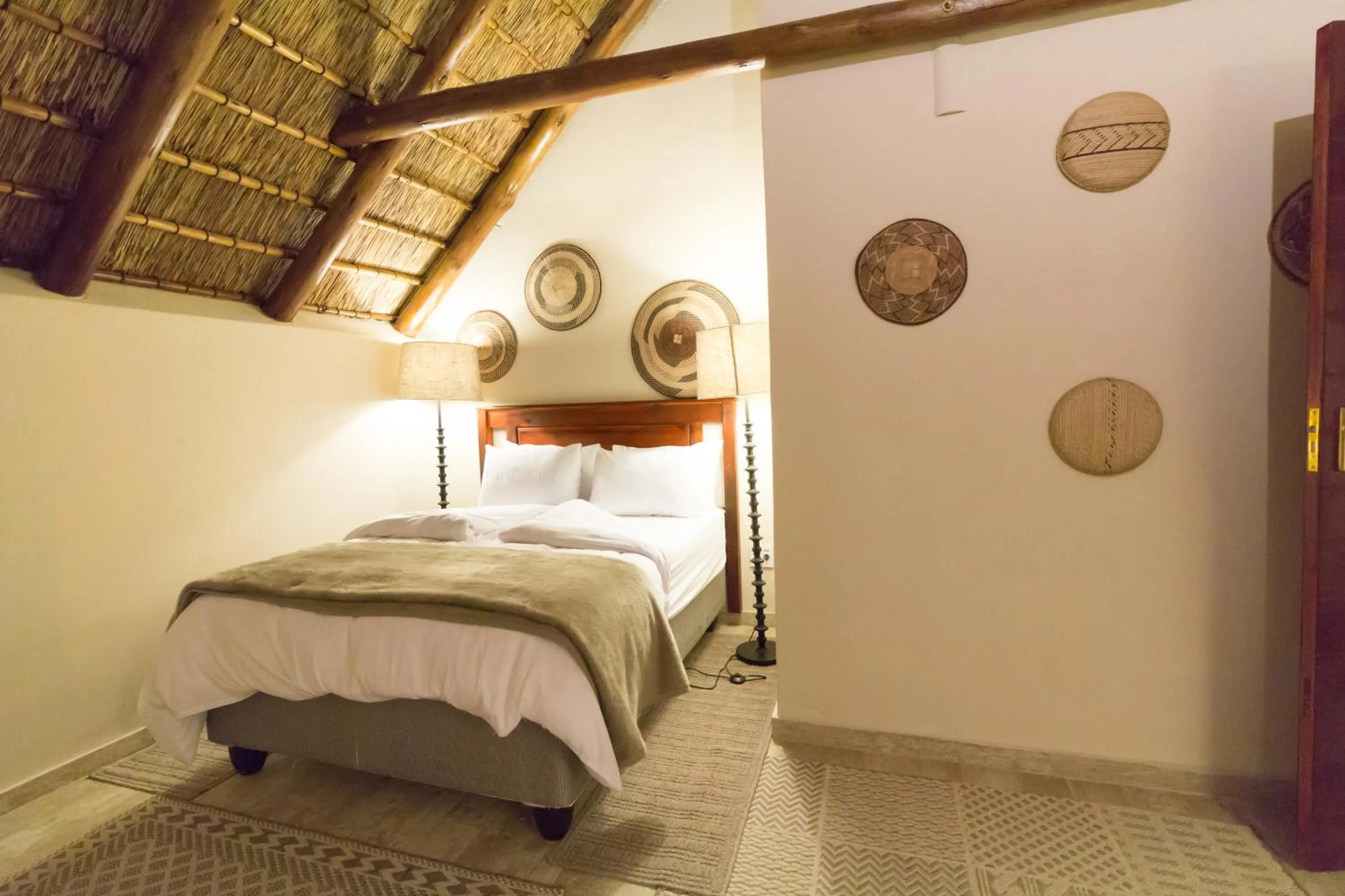 Bed in Vuyani Safari Lodge