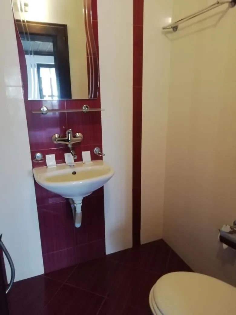 Bathroom in Family Hotel Kalifer