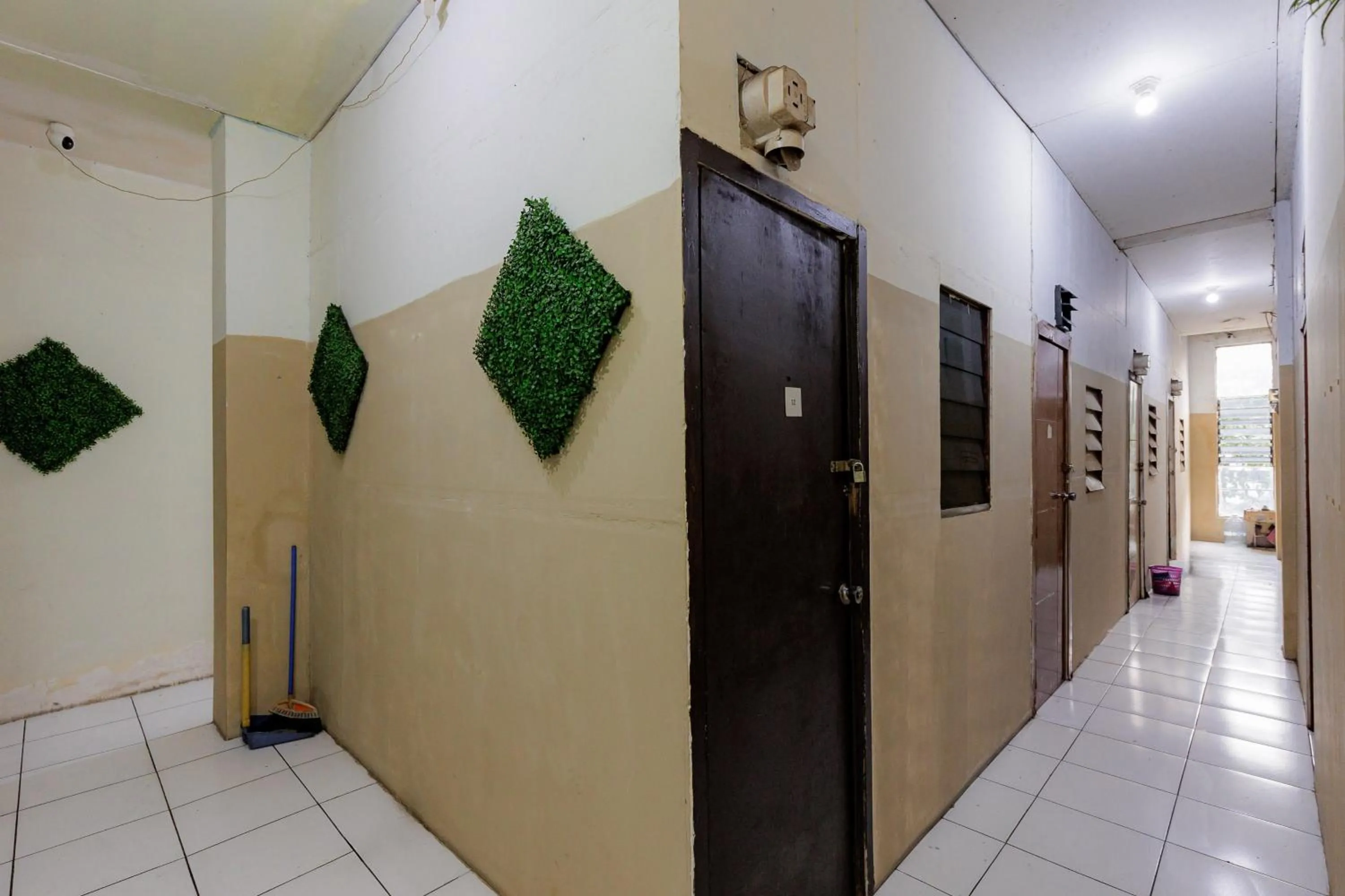 Property building in RedDoorz near Esa Unggul University Jakarta Campus