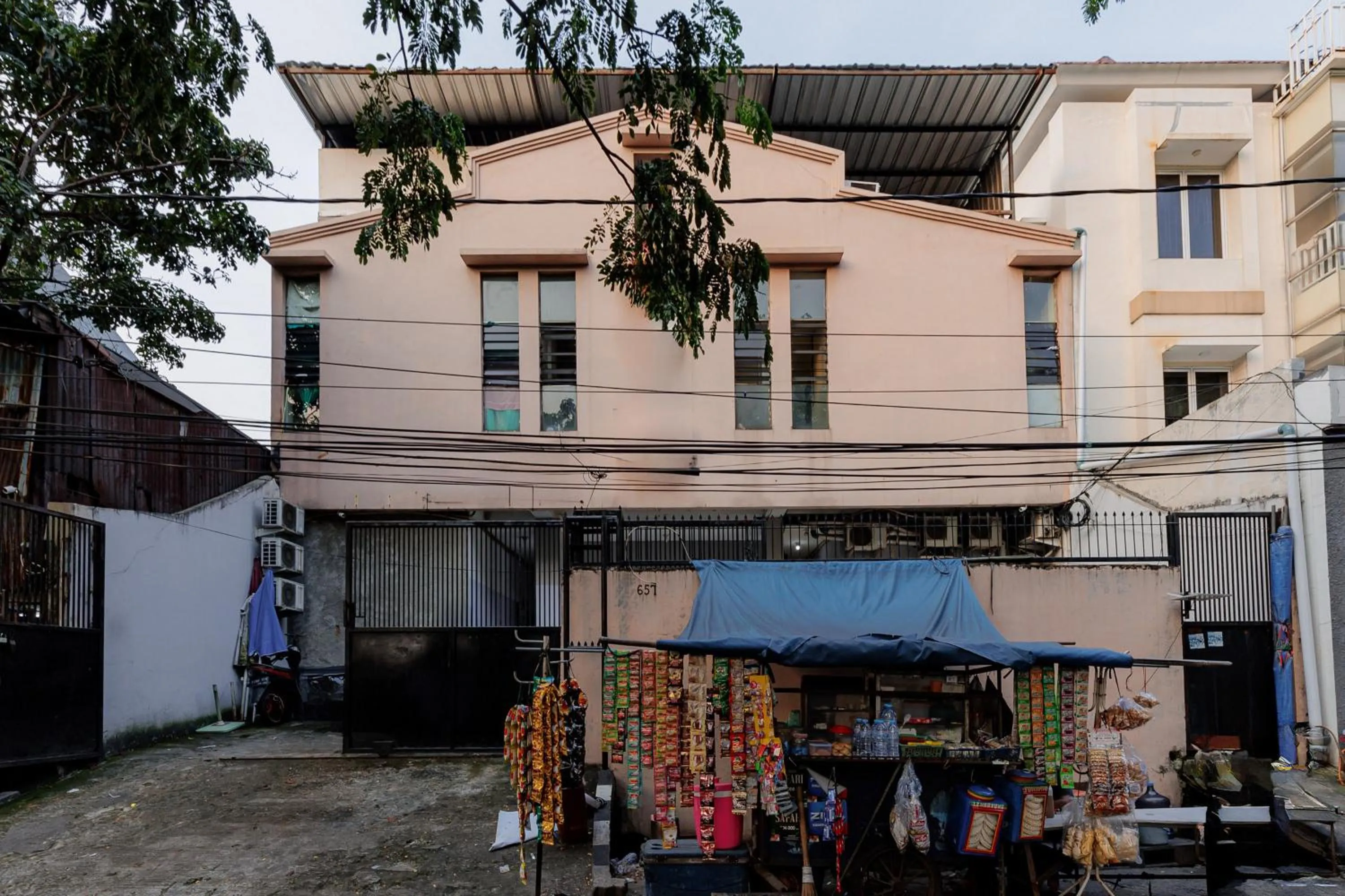 Facade/entrance in RedDoorz near Esa Unggul University Jakarta Campus