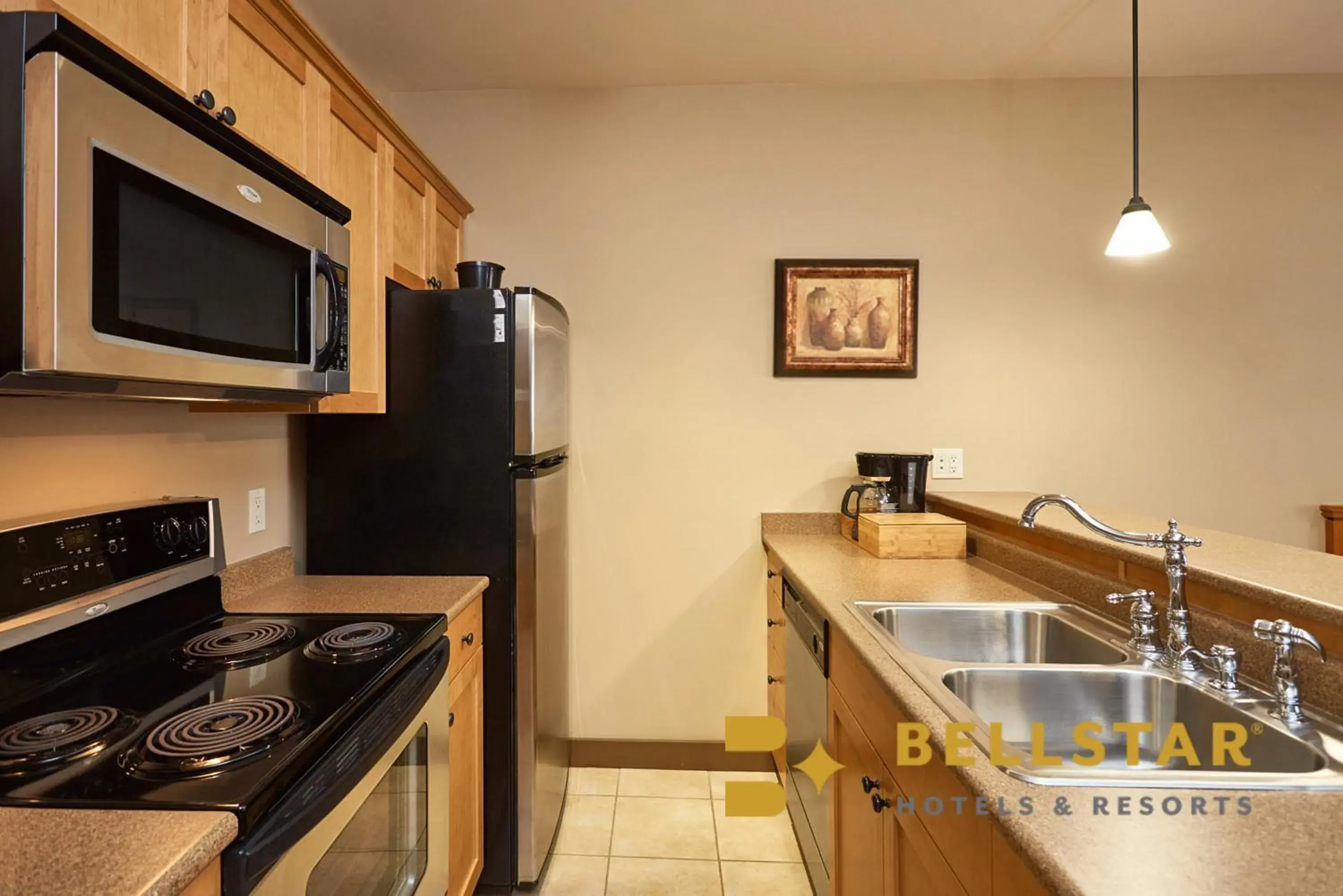 Kitchen or kitchenette in Palliser Lodge — Bellstar Hotels & Resorts Kitchen or kitchenette in Palliser Lodge — Bellstar Hotels & Resorts