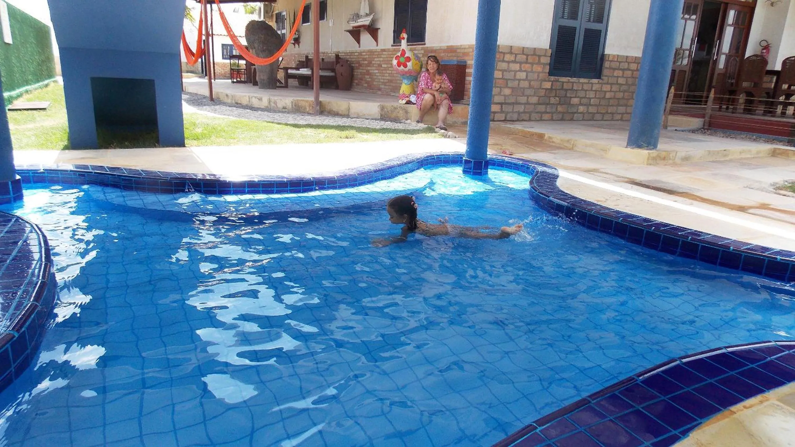 Swimming pool in Pousada do Sol