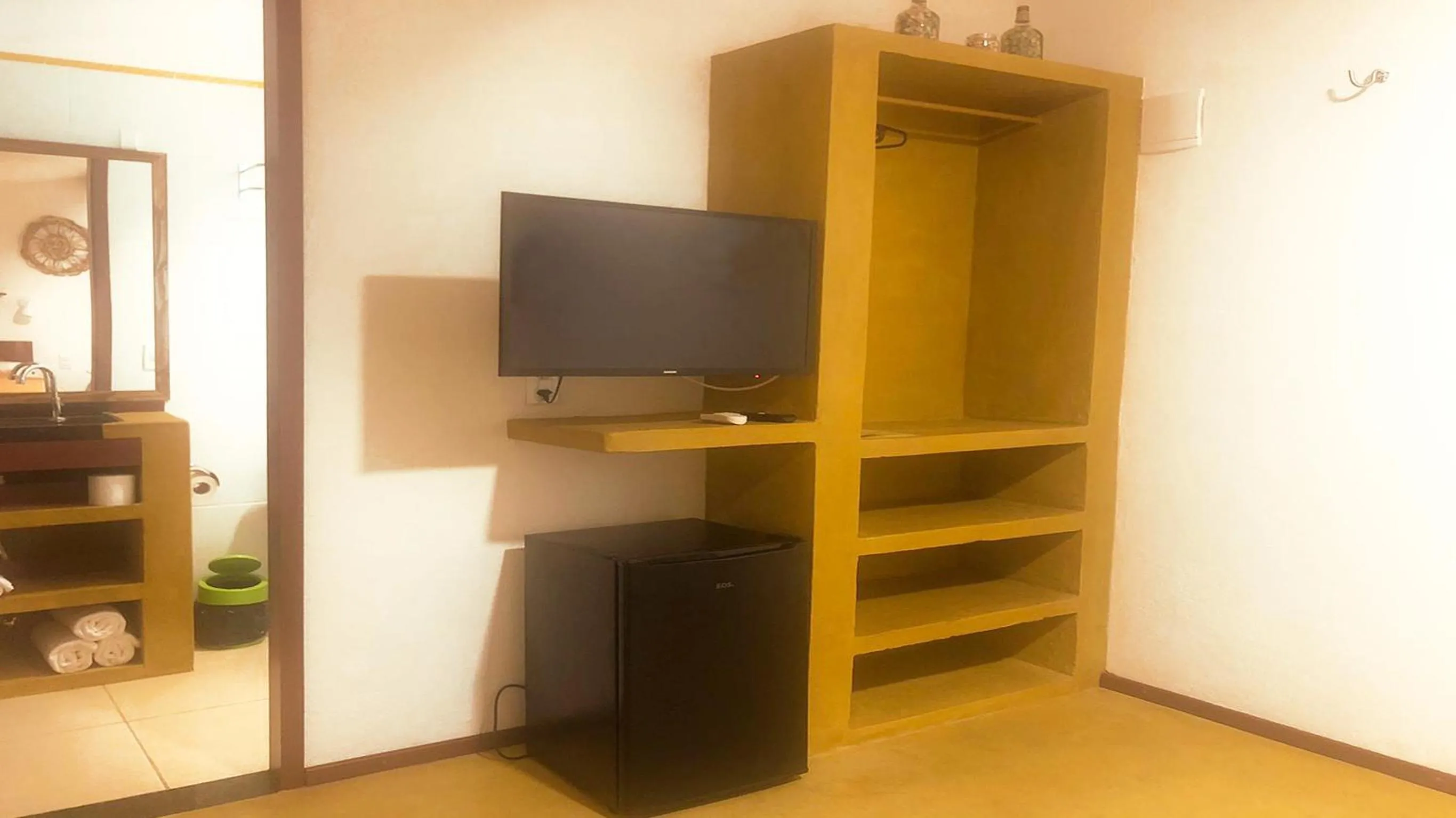 TV and multimedia in Pousada do Sol