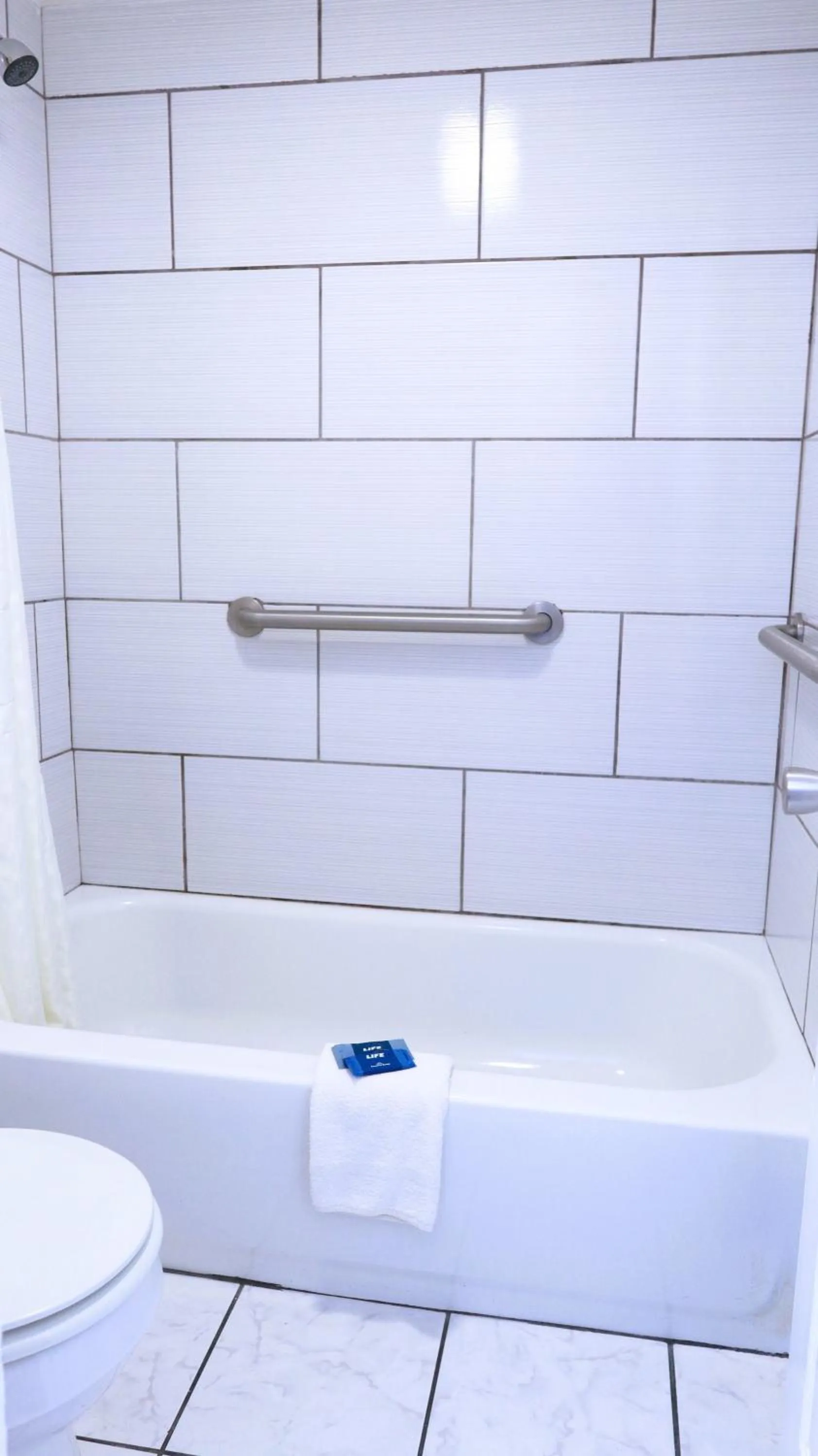 Shower in Americas Best Value Inn Suites & Studios Blytheville by Sonesta