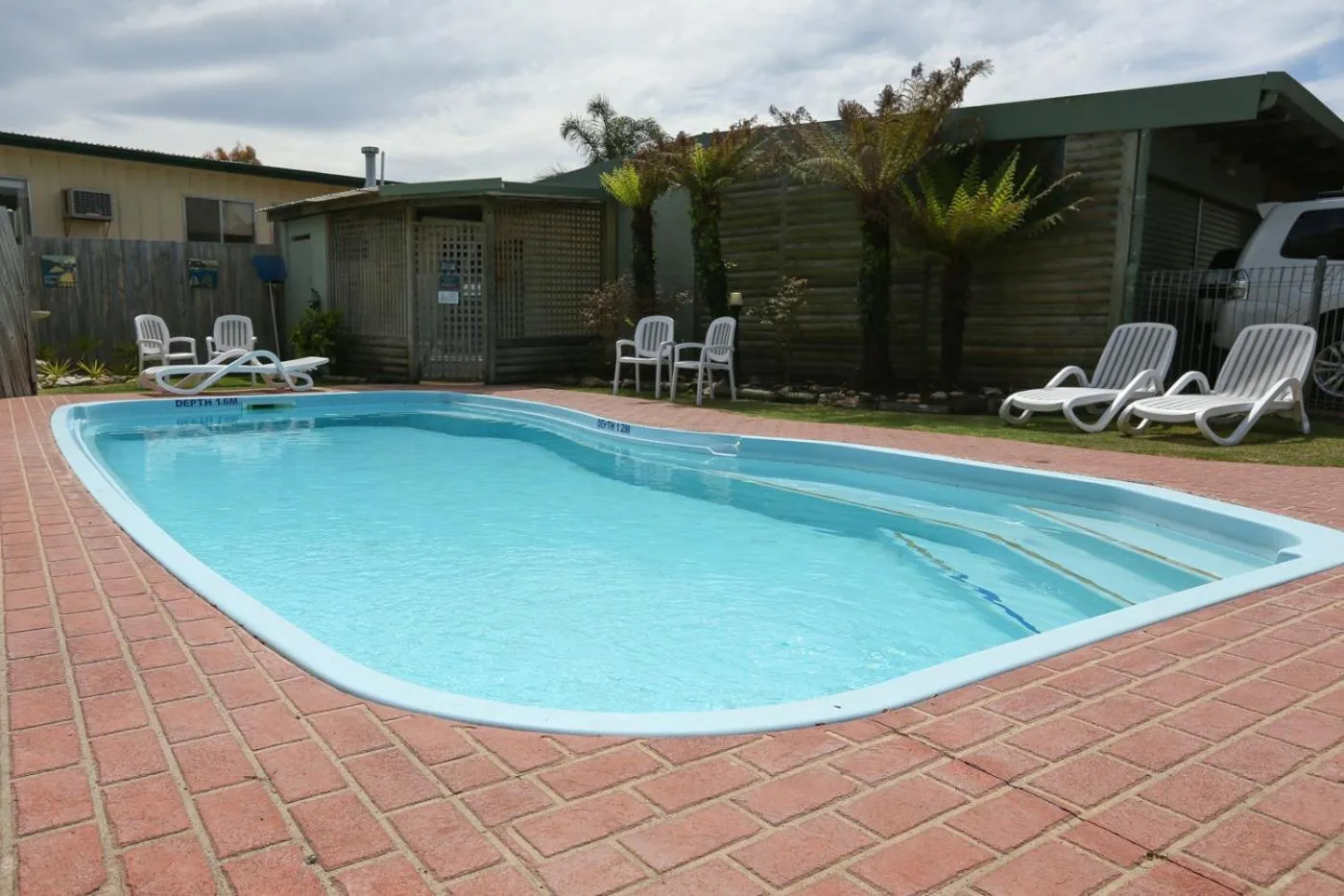Swimming pool in Lazy Acre Log Cabins
