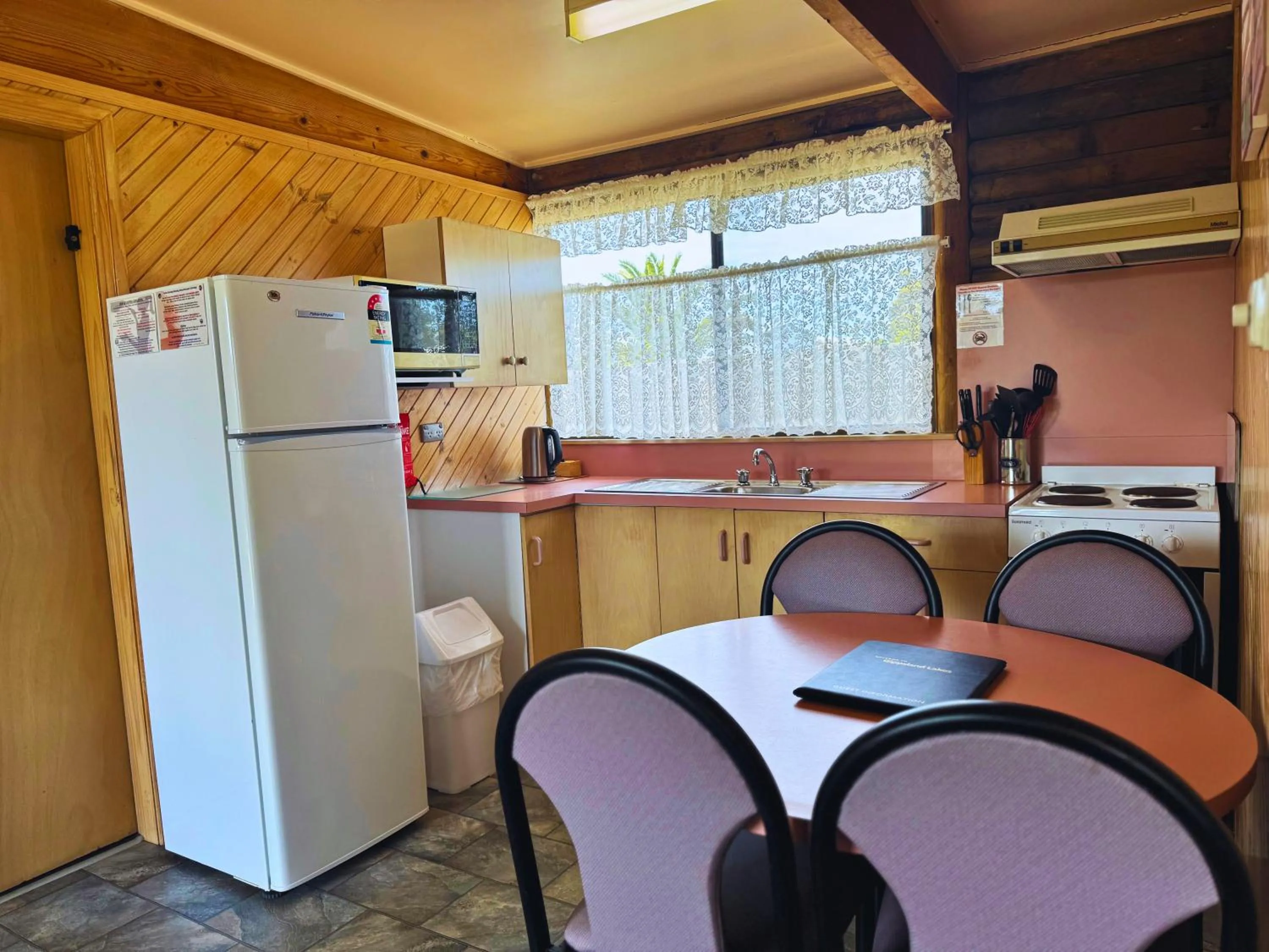 Kitchen or kitchenette in Lazy Acre Log Cabins