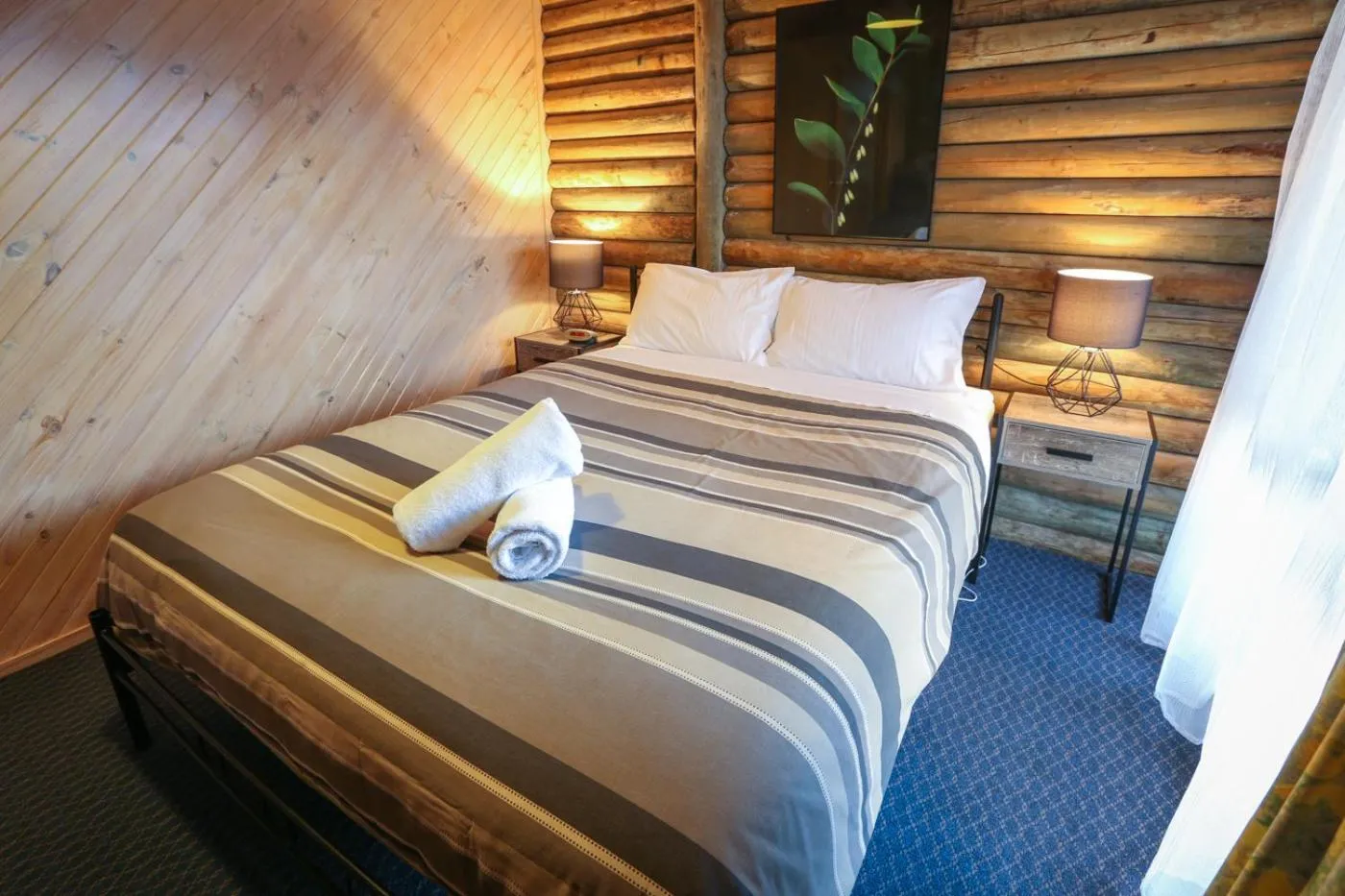 Photo of the whole room, Bed in Lazy Acre Log Cabins