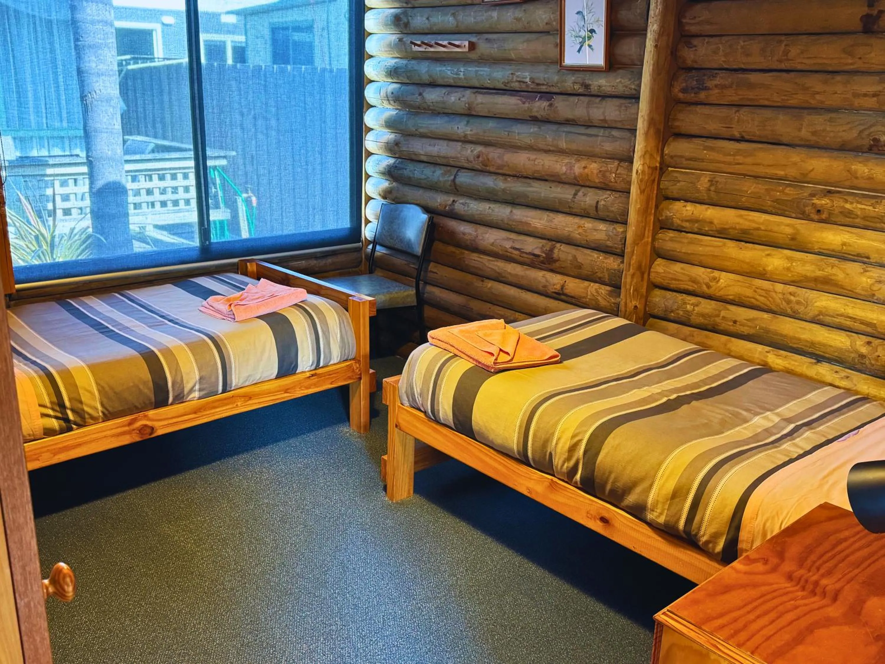 Bedroom, Bed in Lazy Acre Log Cabins