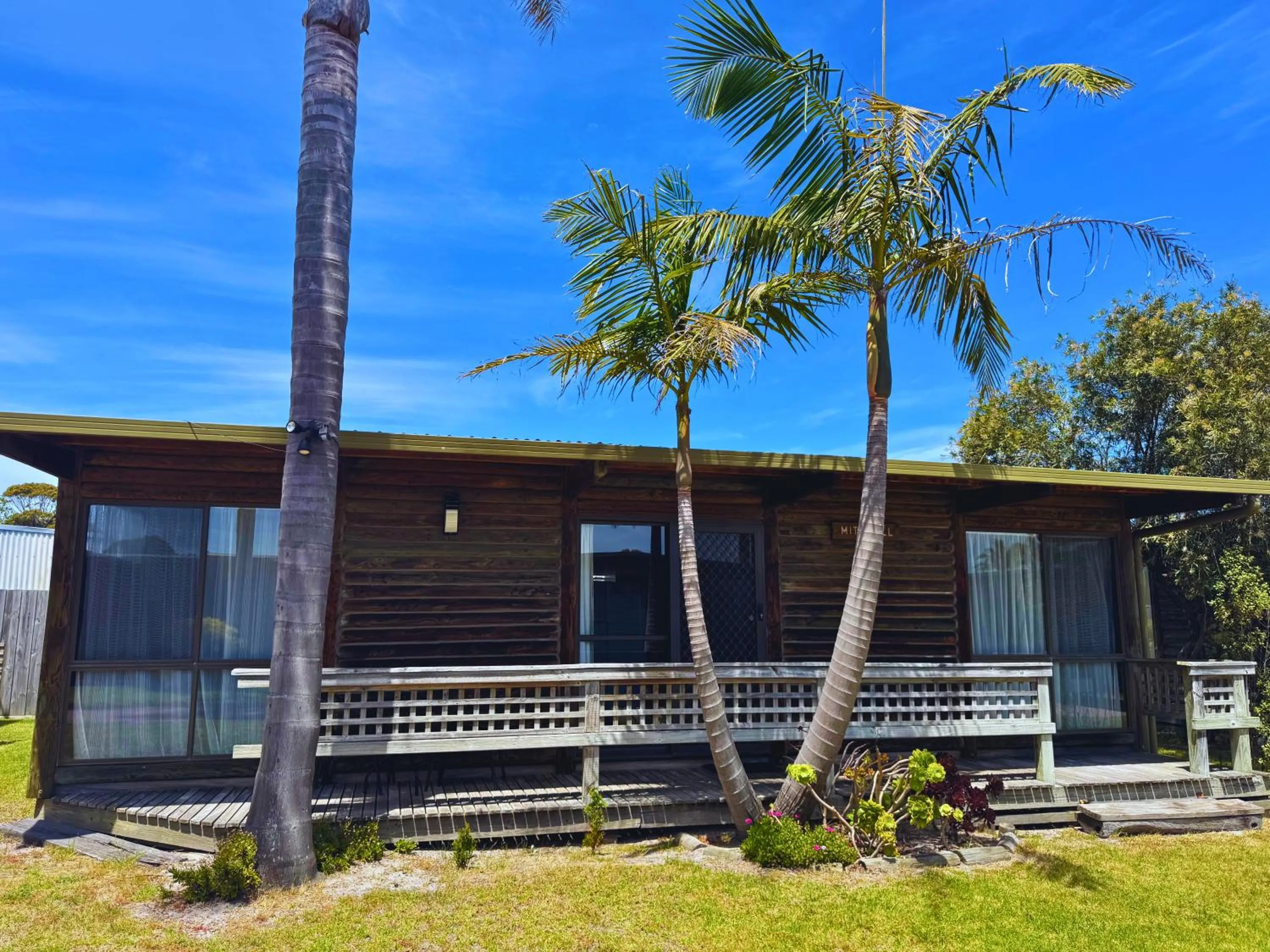 Guests in Lazy Acre Log Cabins