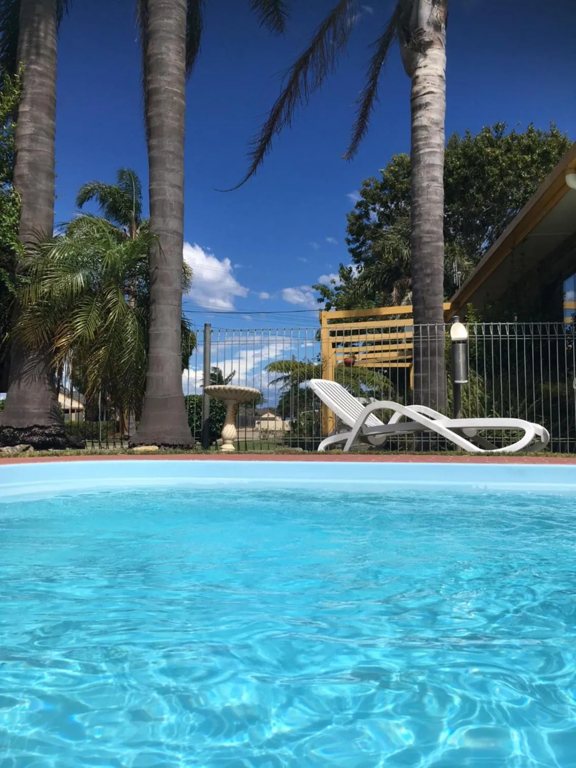 Swimming pool in Lazy Acre Log Cabins
