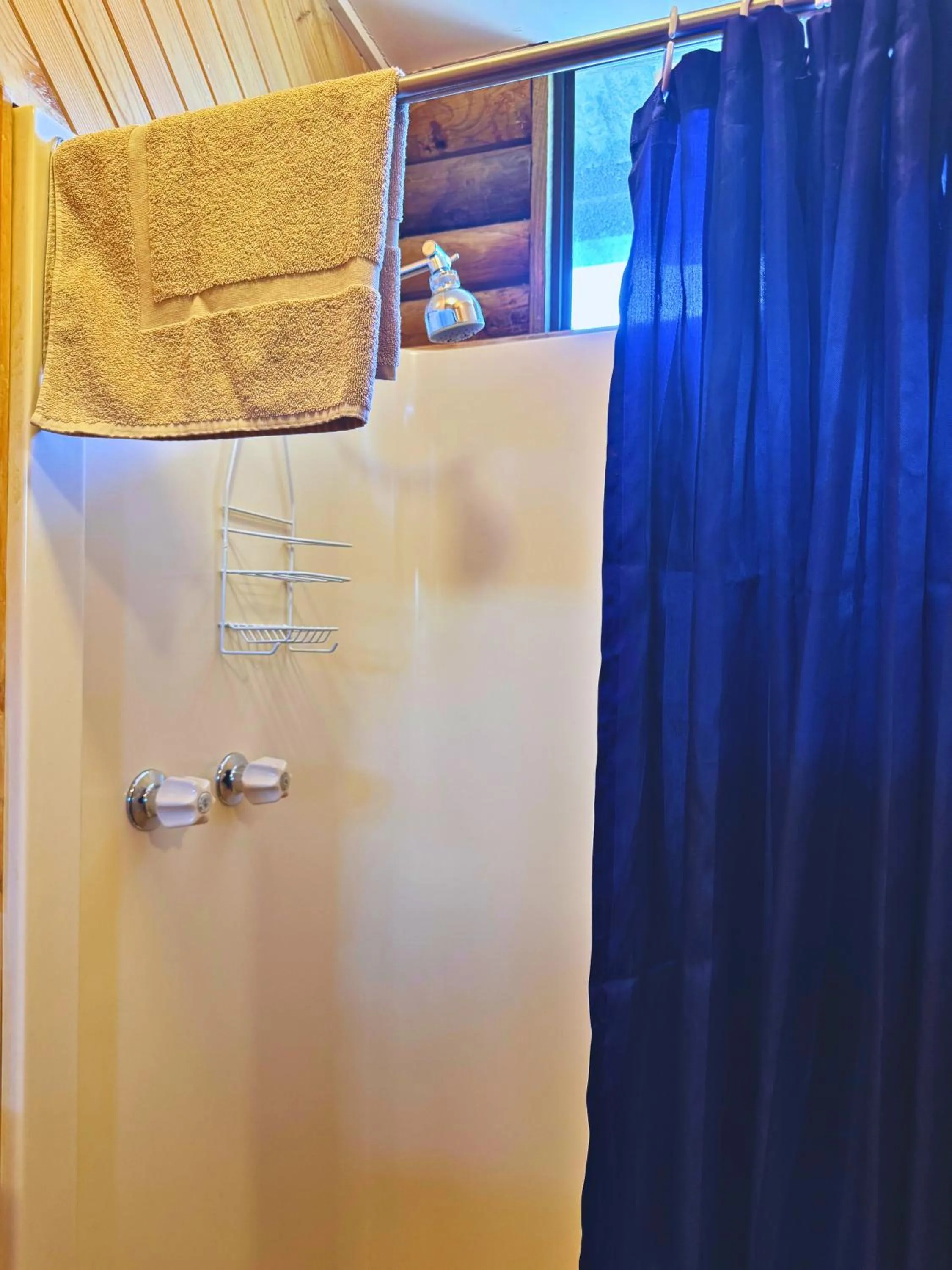 Shower in Lazy Acre Log Cabins