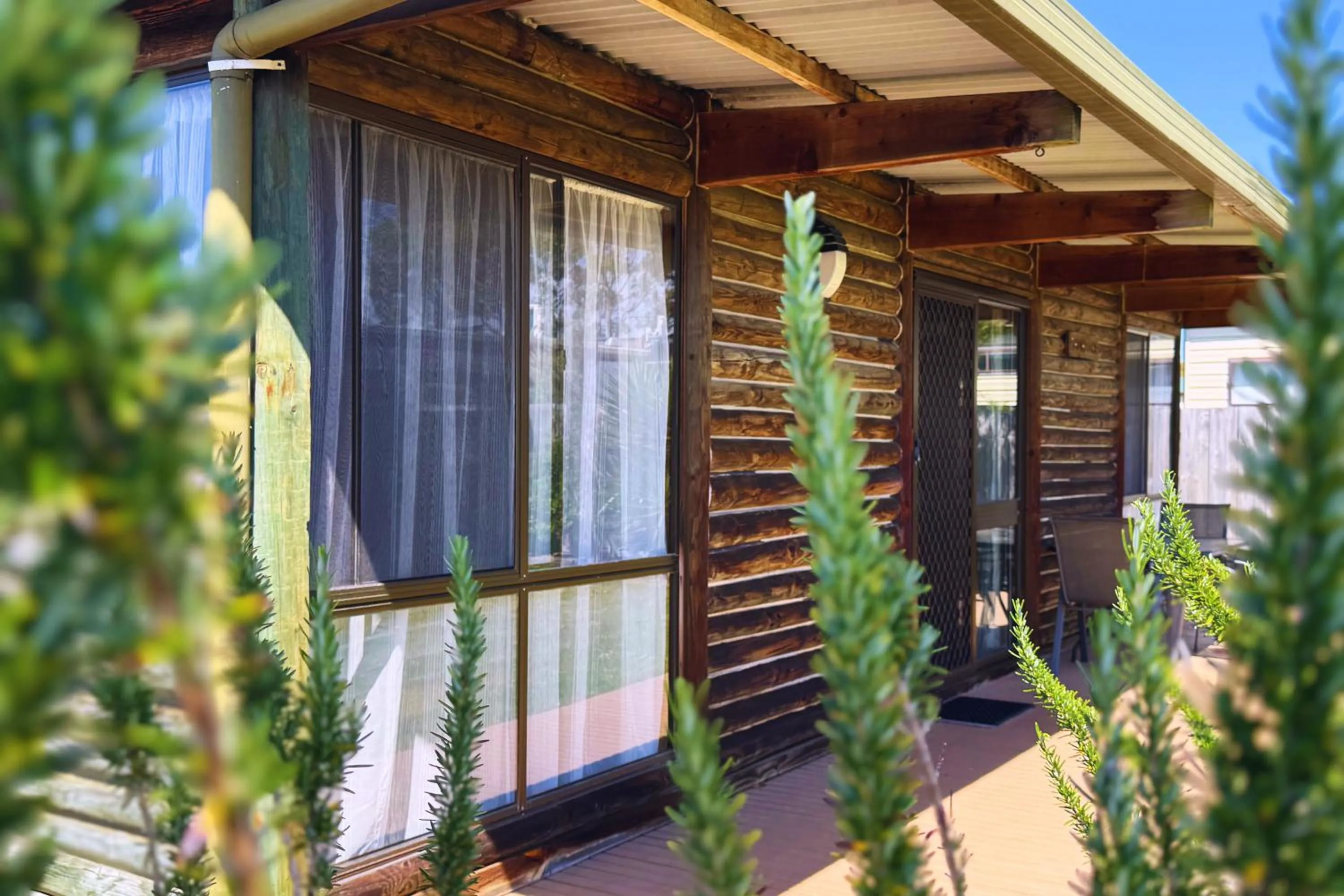 Property building in Lazy Acre Log Cabins