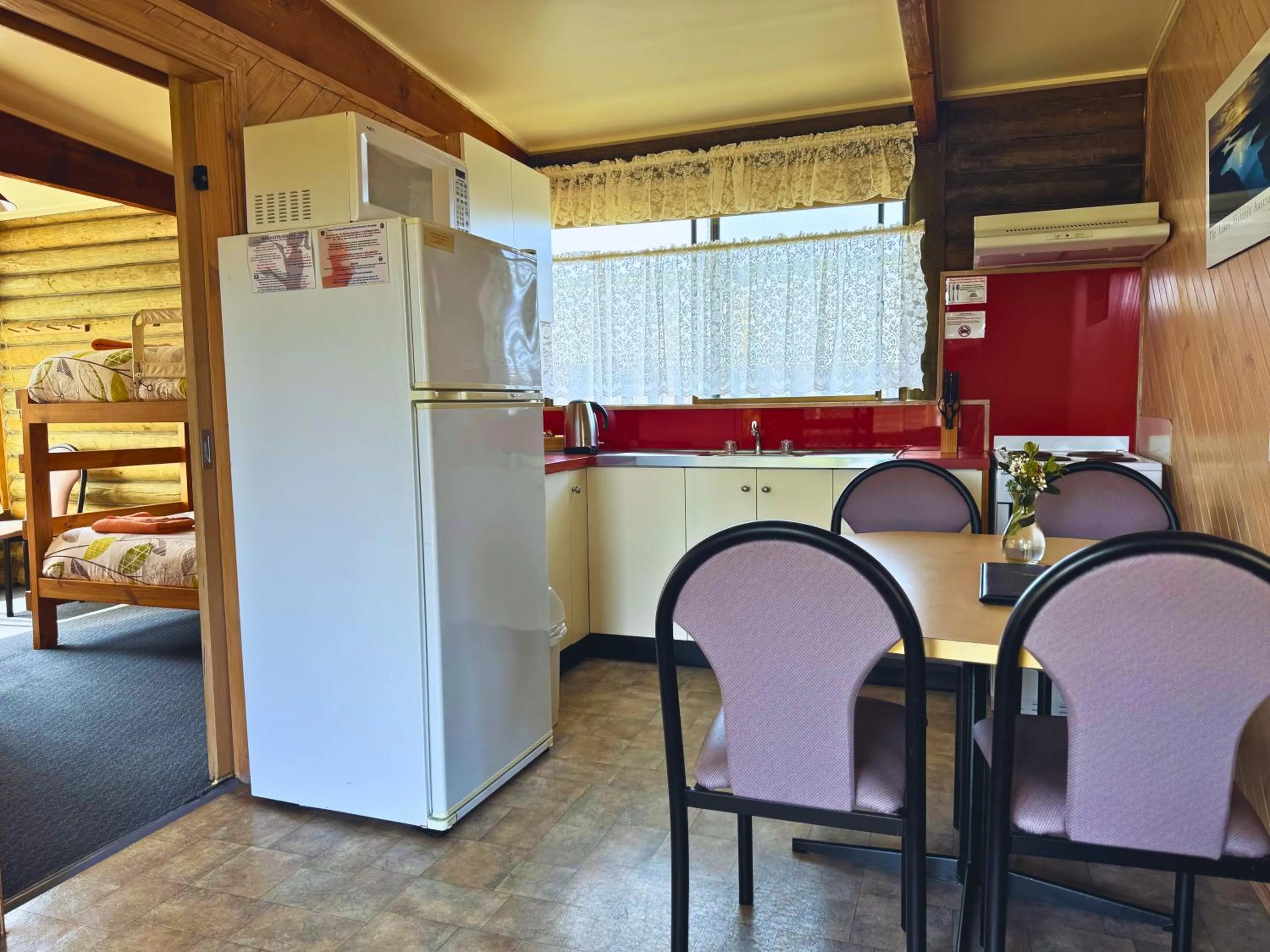Kitchen or kitchenette in Lazy Acre Log Cabins