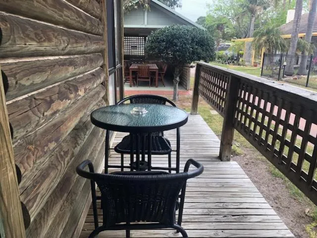 Seating area in Lazy Acre Log Cabins