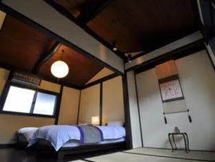 Bed in Kikyo-an Cozy Private Machiya near JR Nijo Station