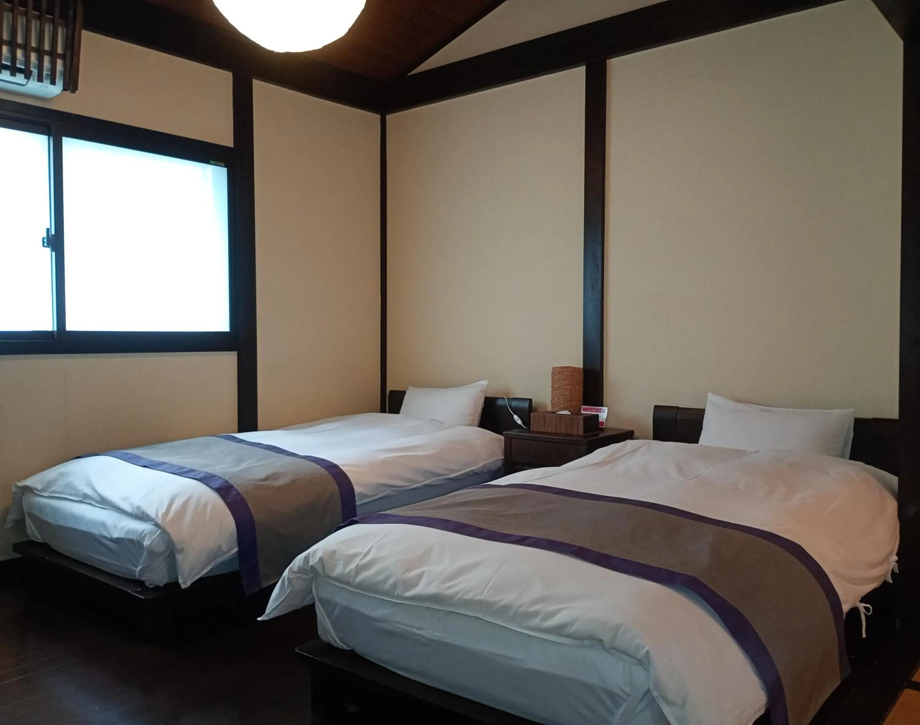 Bed in Kikyo-an Cozy Private Machiya near JR Nijo Station