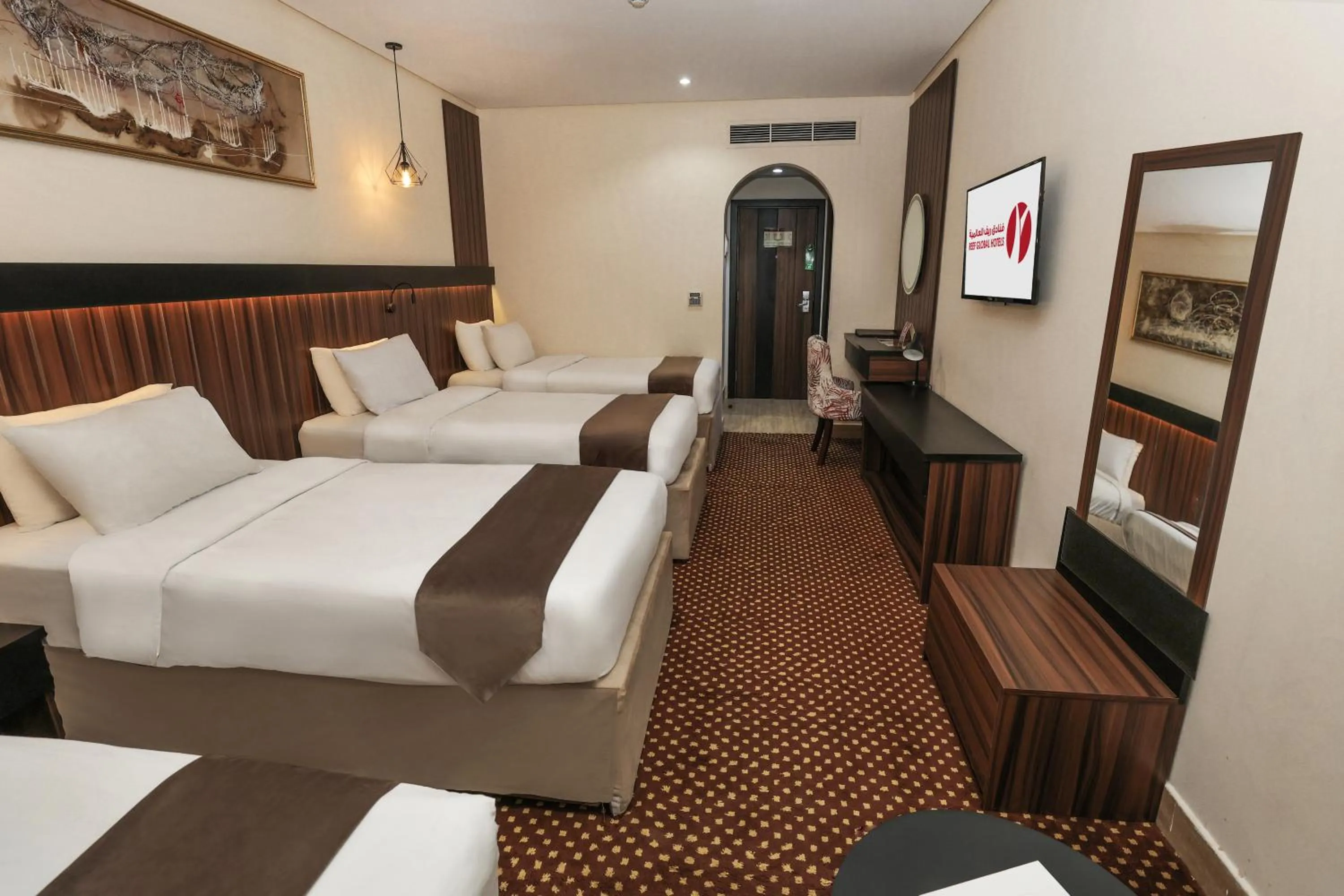 Bed in Reef Global Hotel