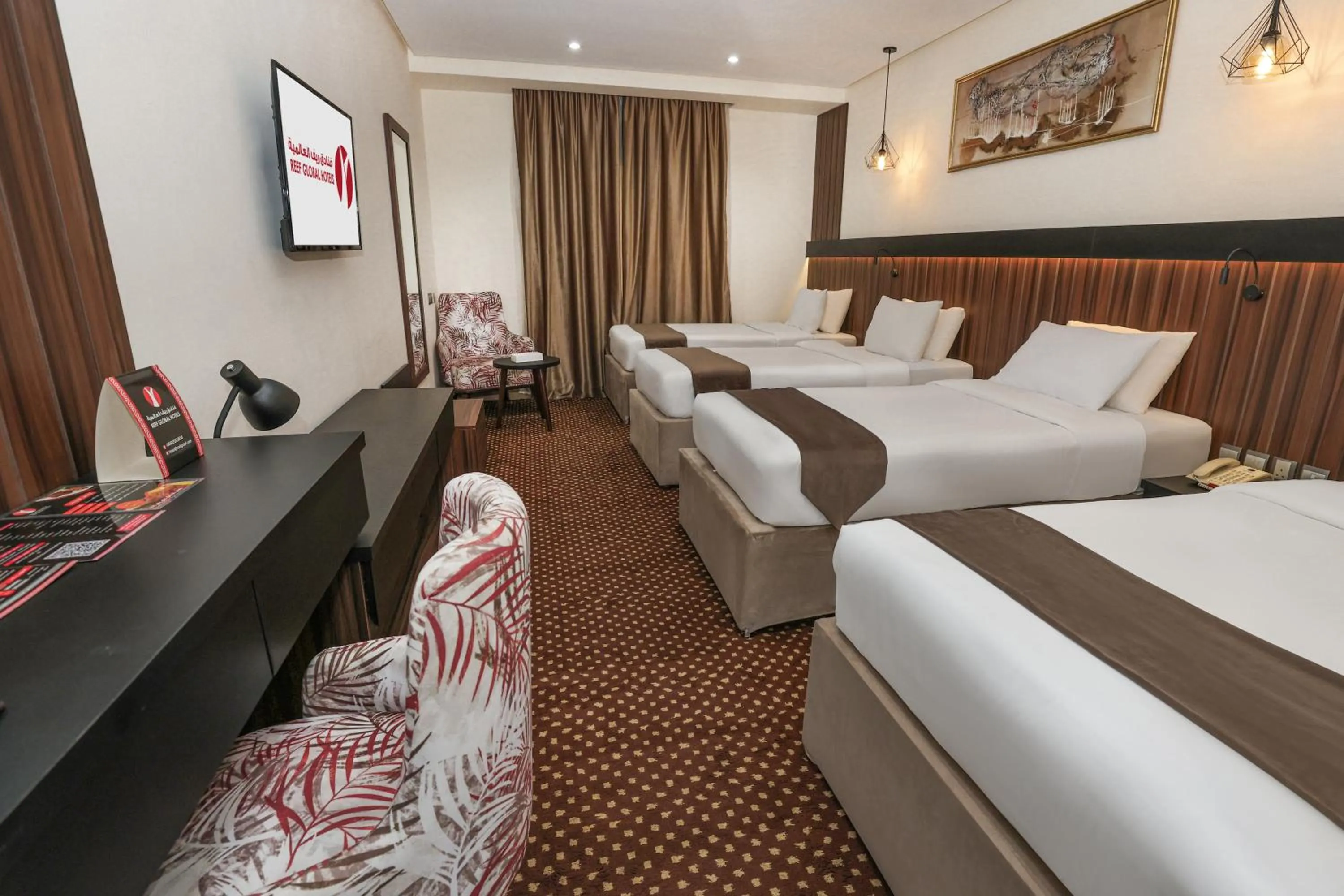 Bed in Reef Global Hotel