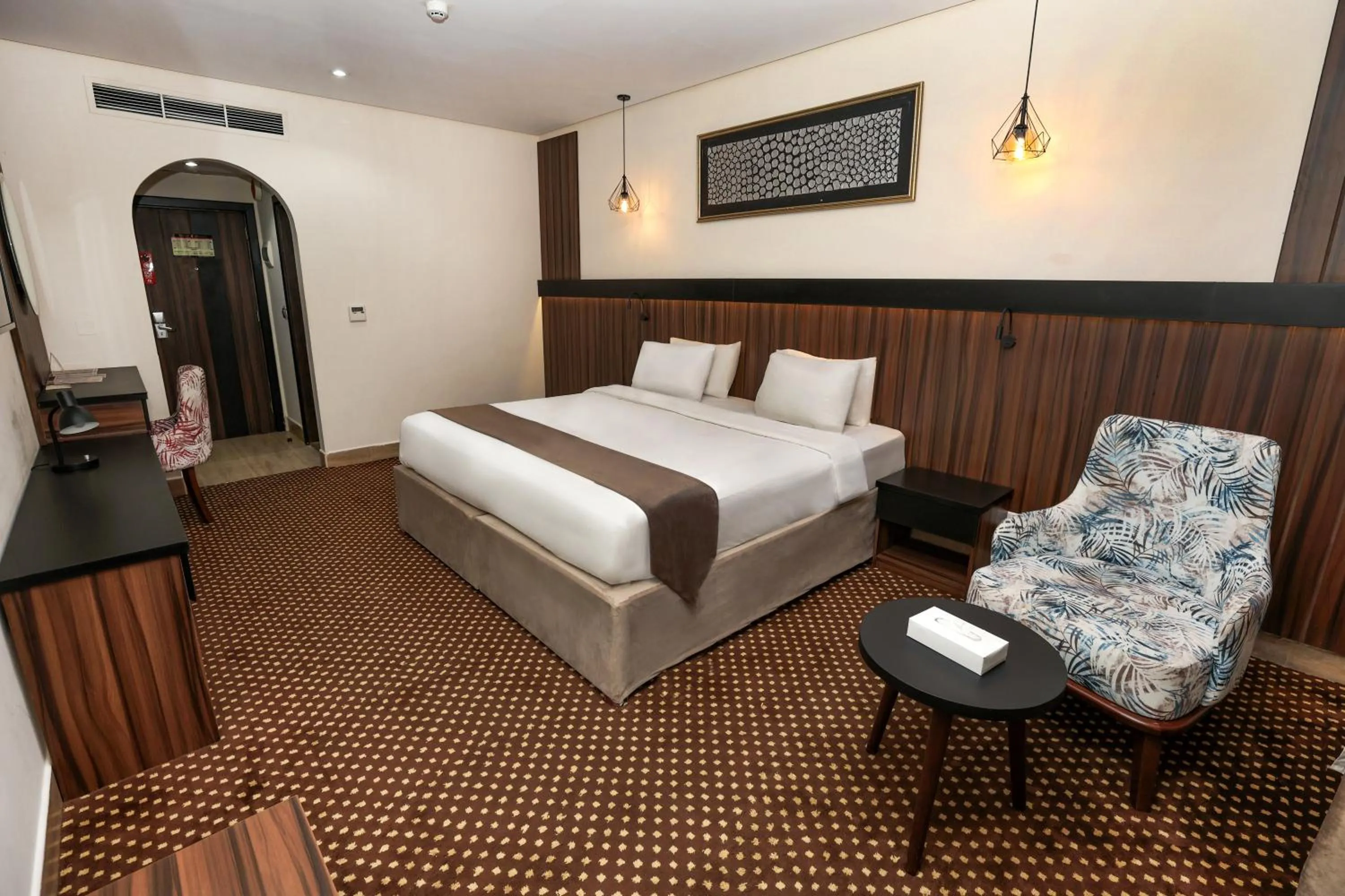 Bed in Reef Global Hotel