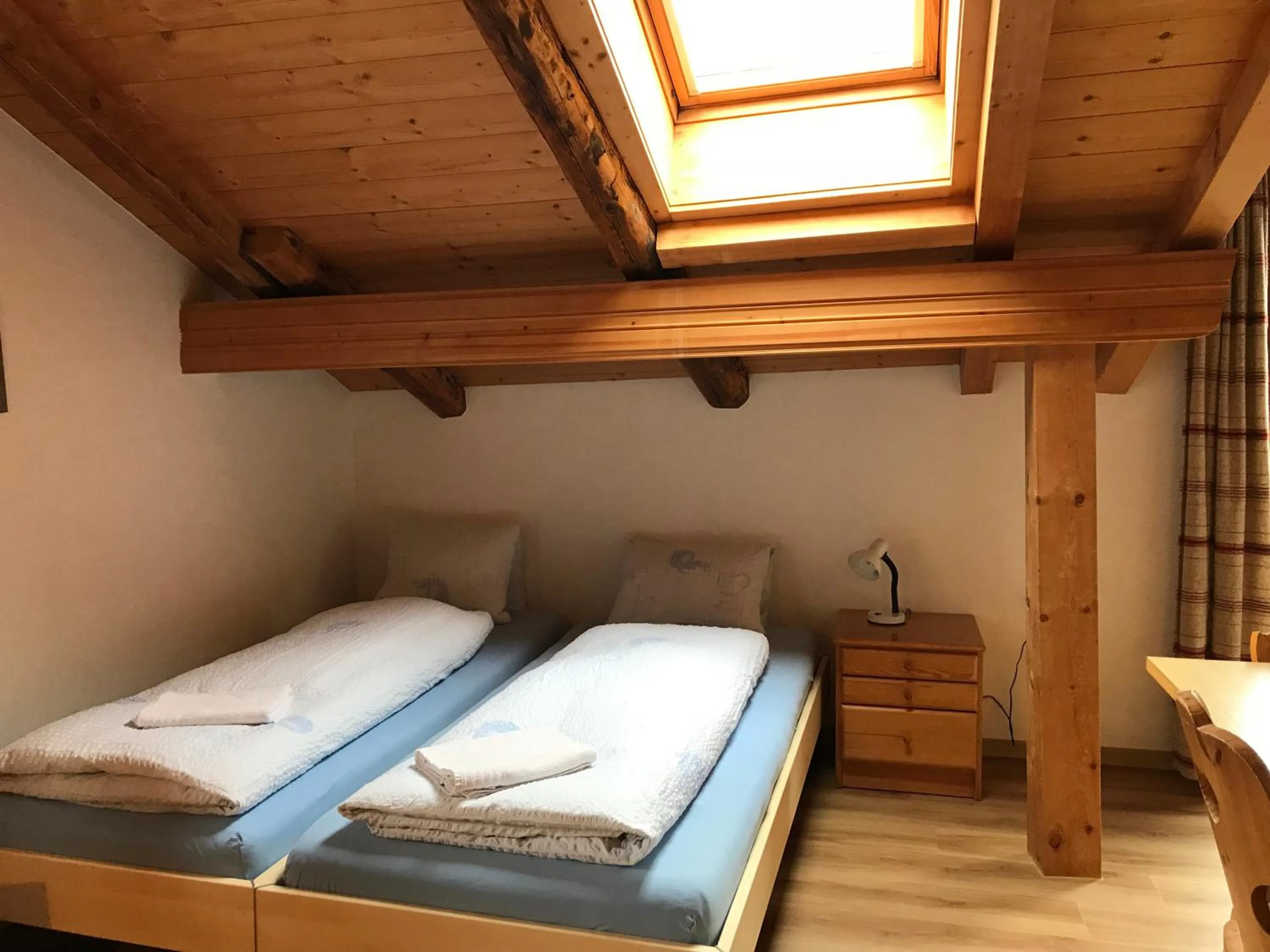 Photo of the whole room, Bed in B&B Hotel & Appartements Chasa Valär