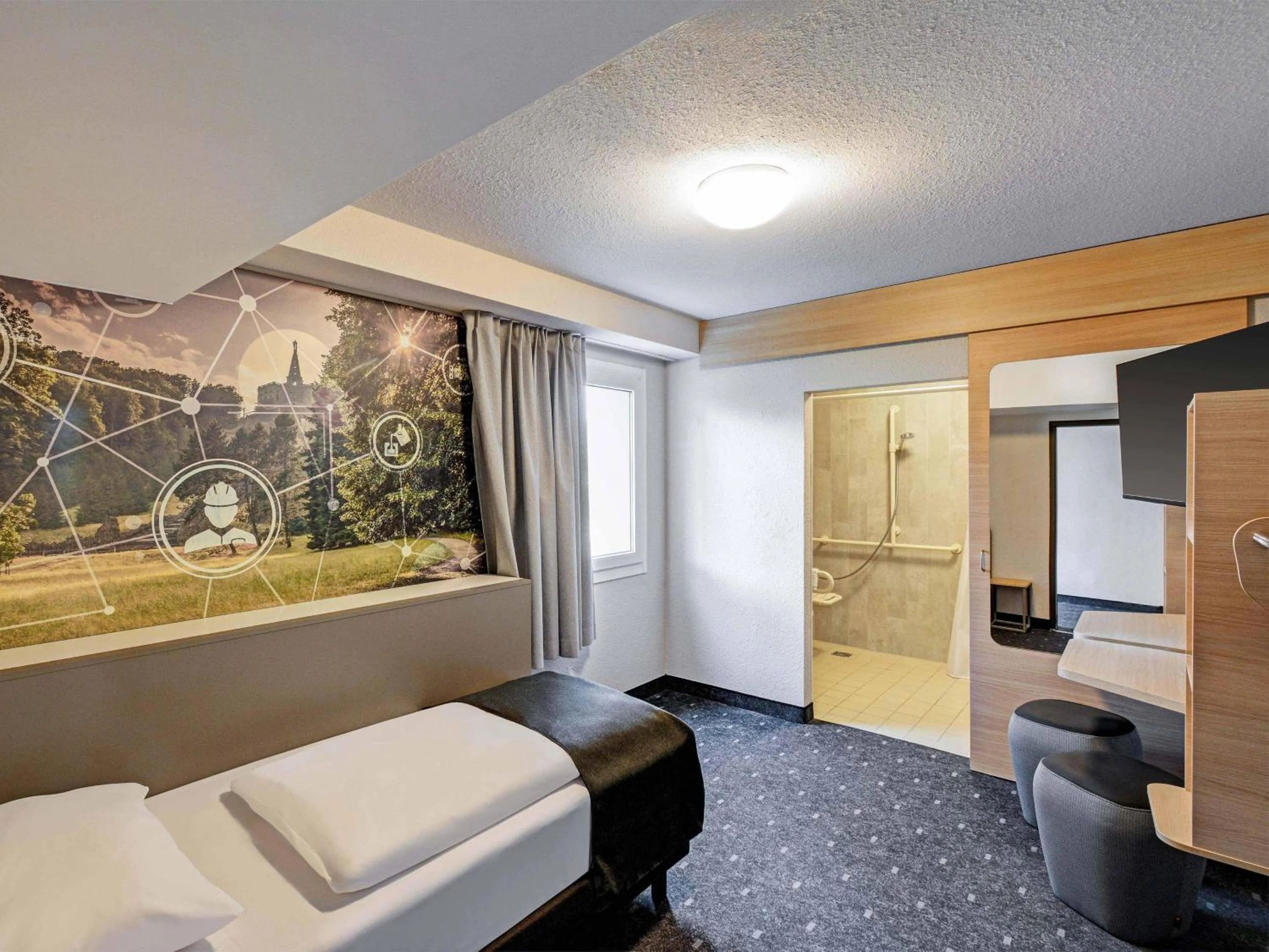 Photo of the whole room, Bed in B&B HOTEL Kassel-Industriepark