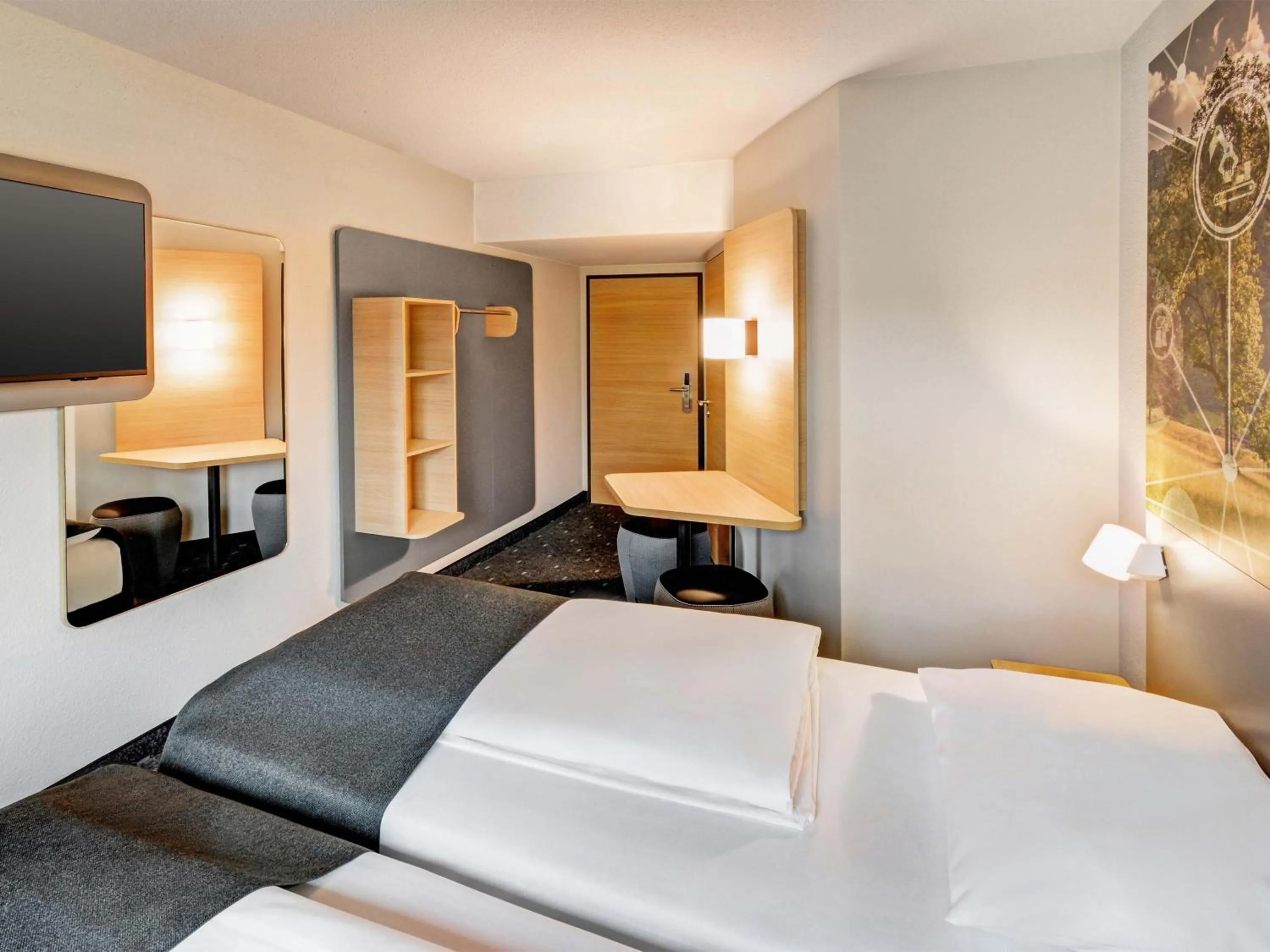 Photo of the whole room, Bed in B&B HOTEL Kassel-Industriepark