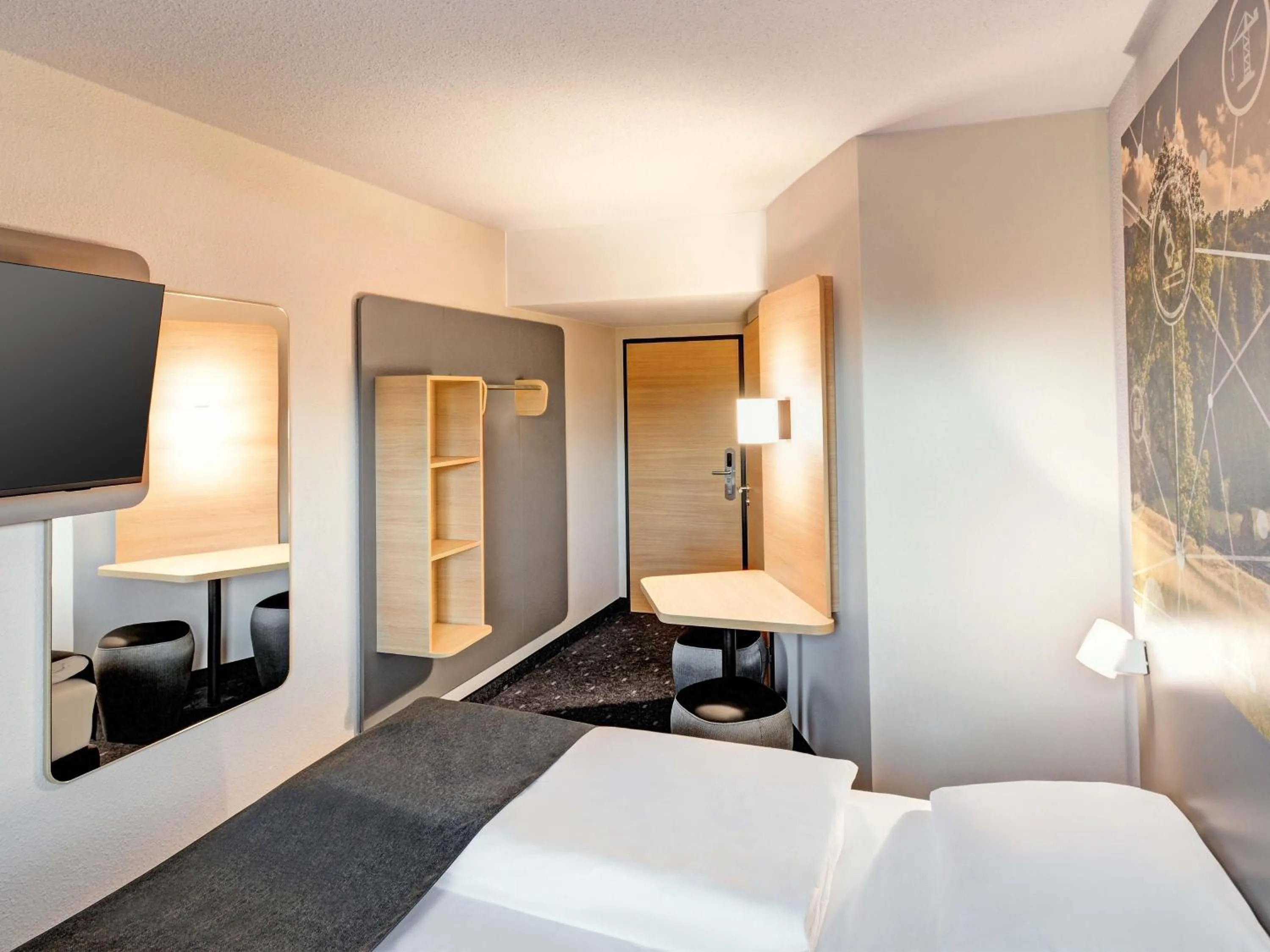 Photo of the whole room, Bed in B&B HOTEL Kassel-Industriepark