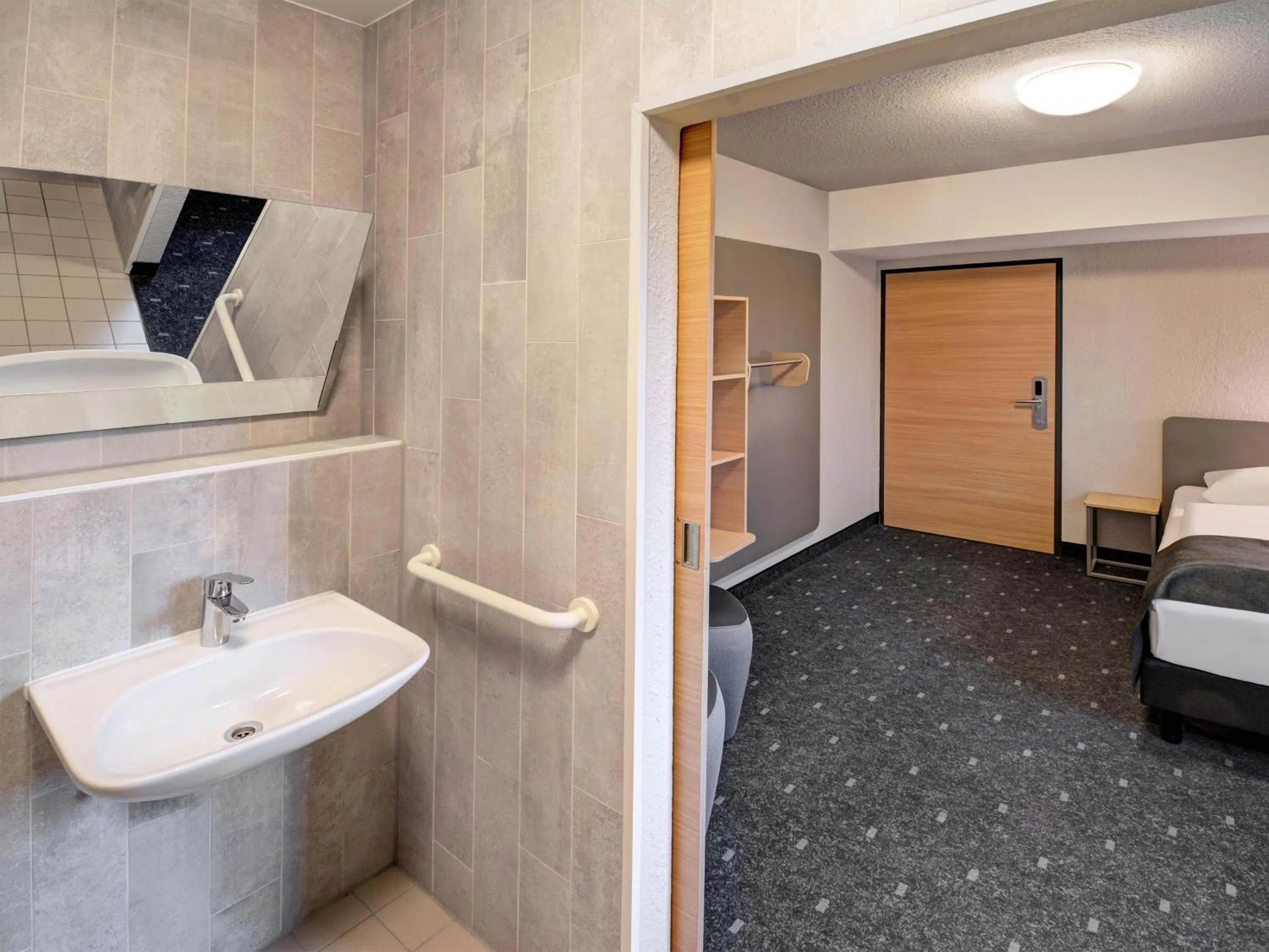 Bathroom, Bed in B&B HOTEL Kassel-Industriepark