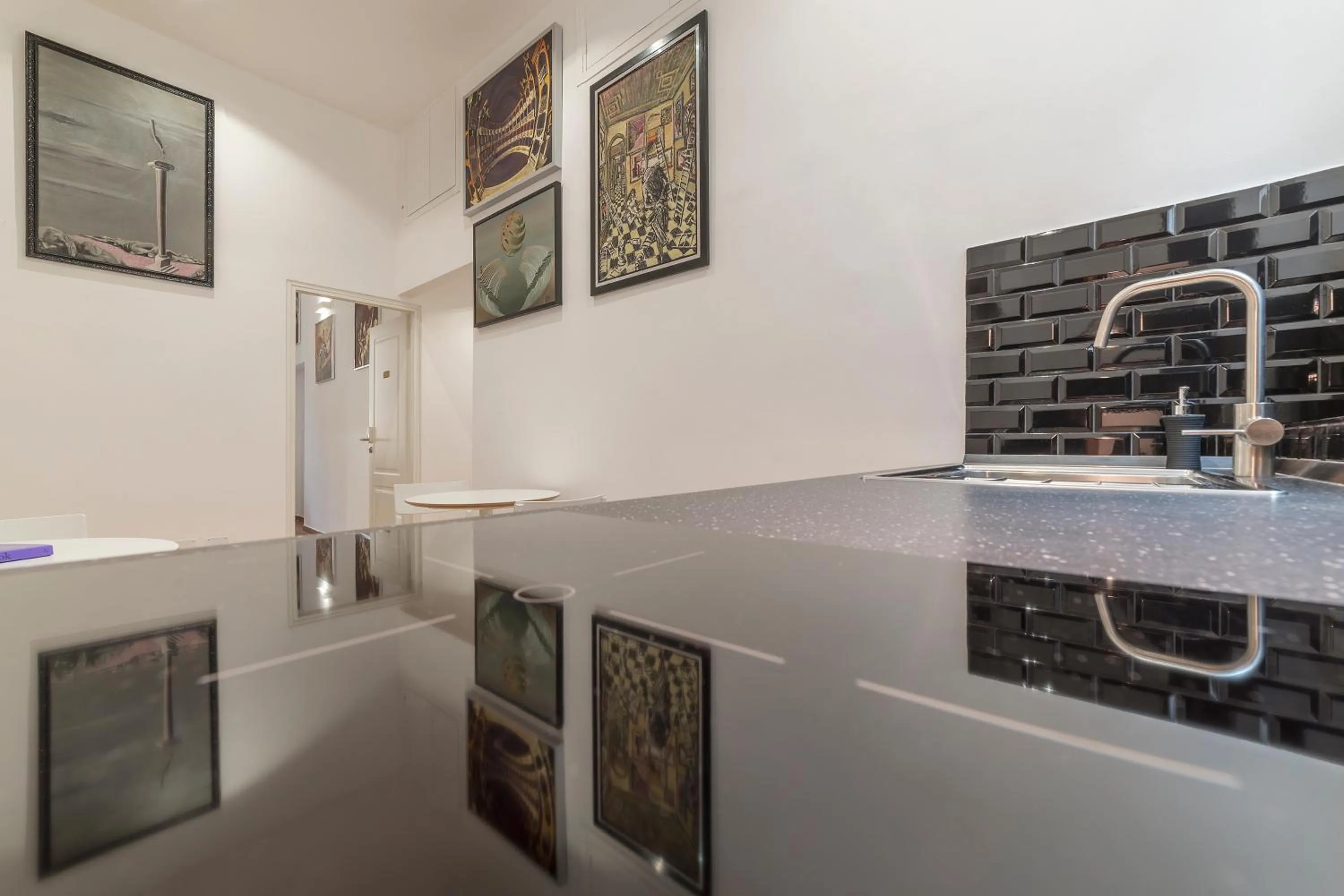 Communal kitchen in Appartamento Via Genova