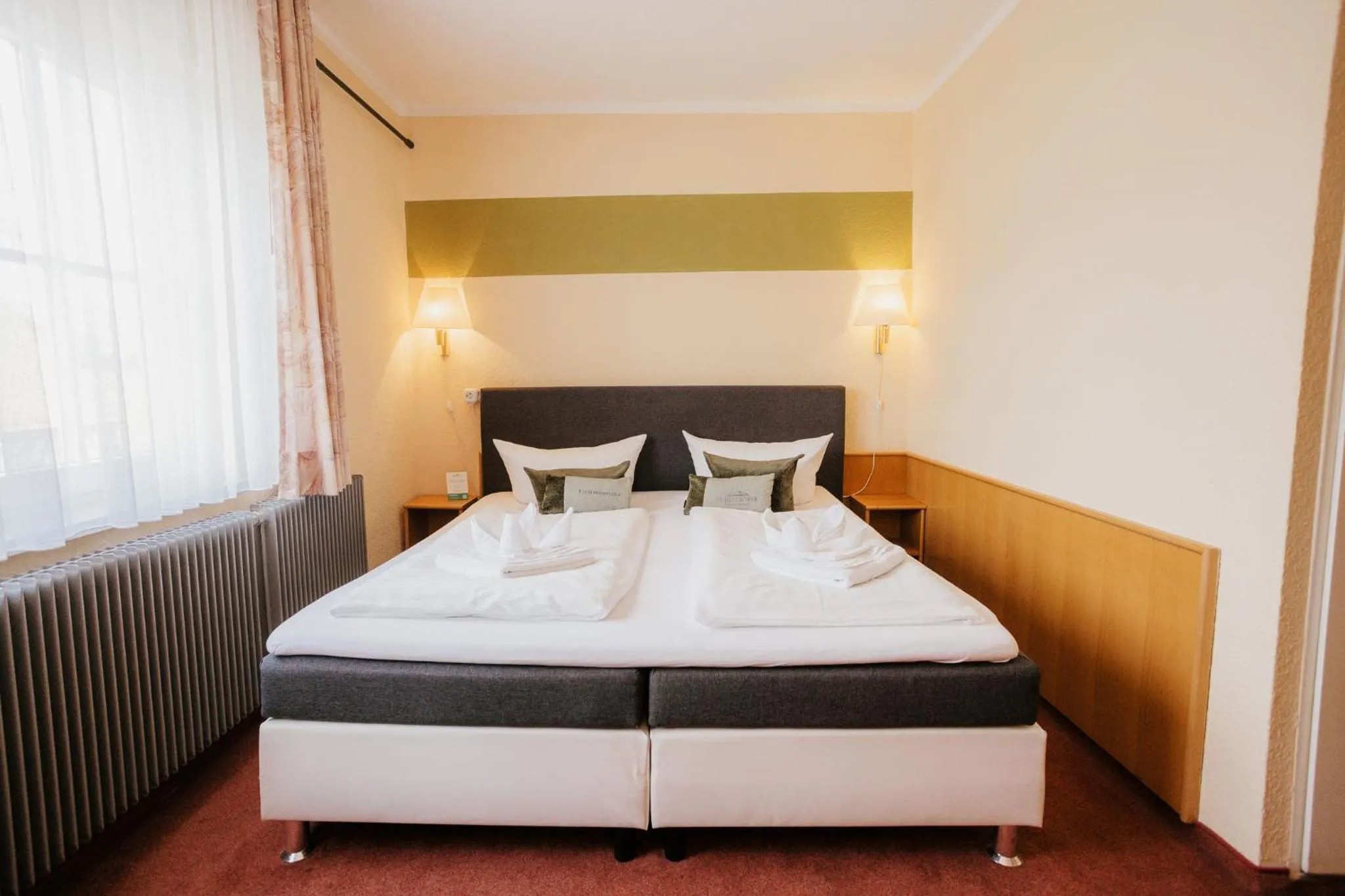 Photo of the whole room, Bed in HarzHotel Güntersberge