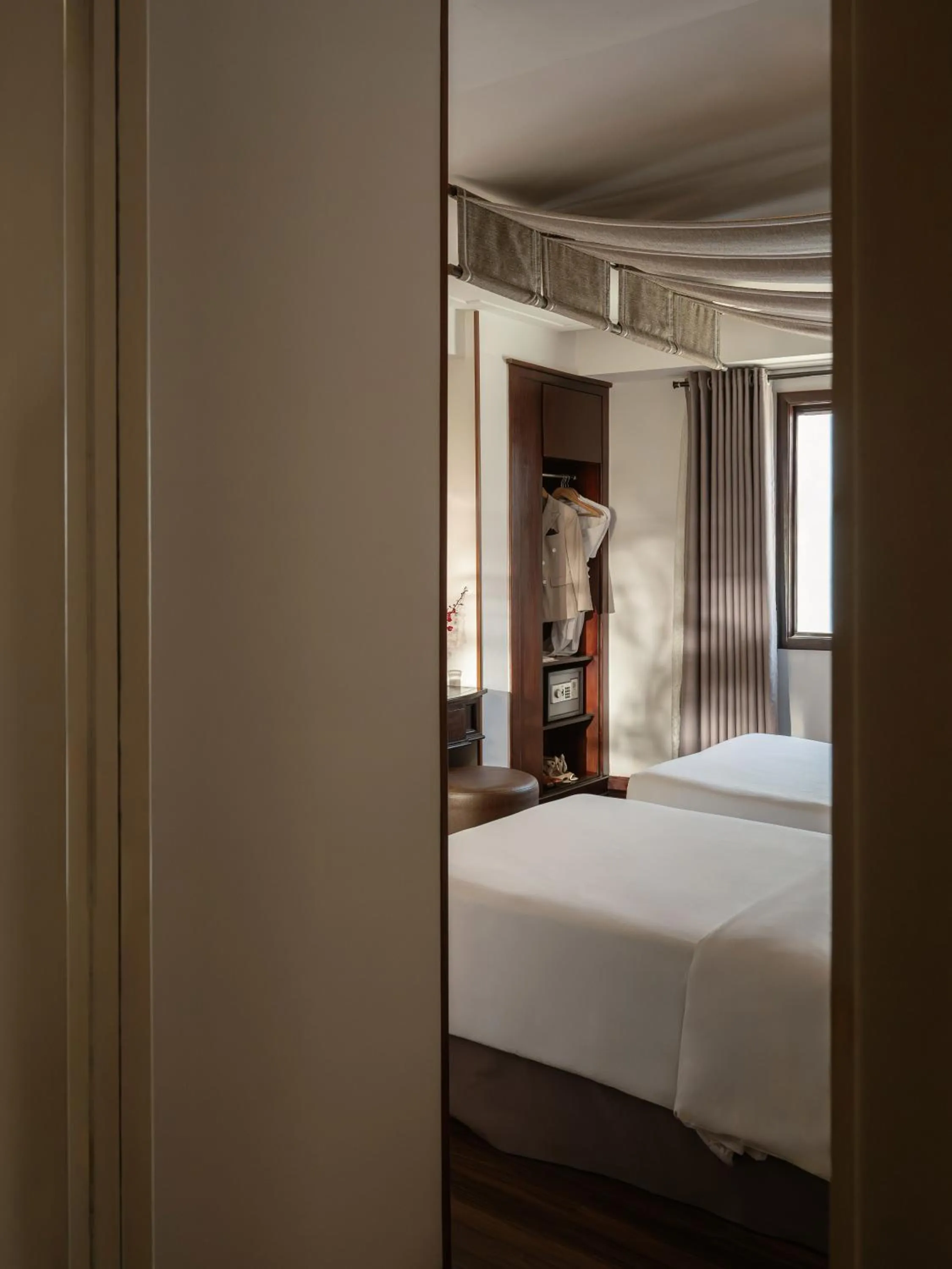 Bed in The Odys Boutique Hotel