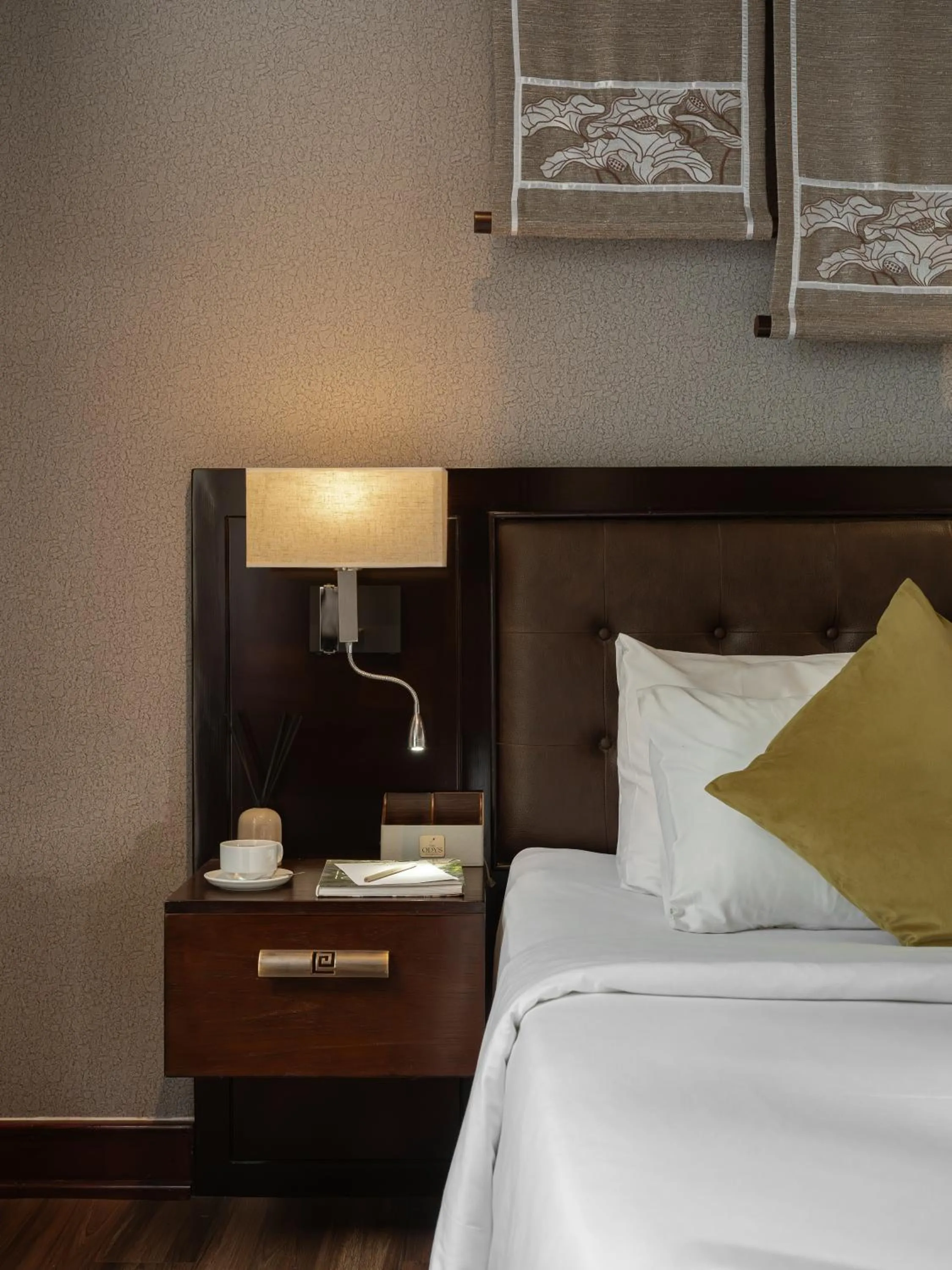 Bed in The Odys Boutique Hotel