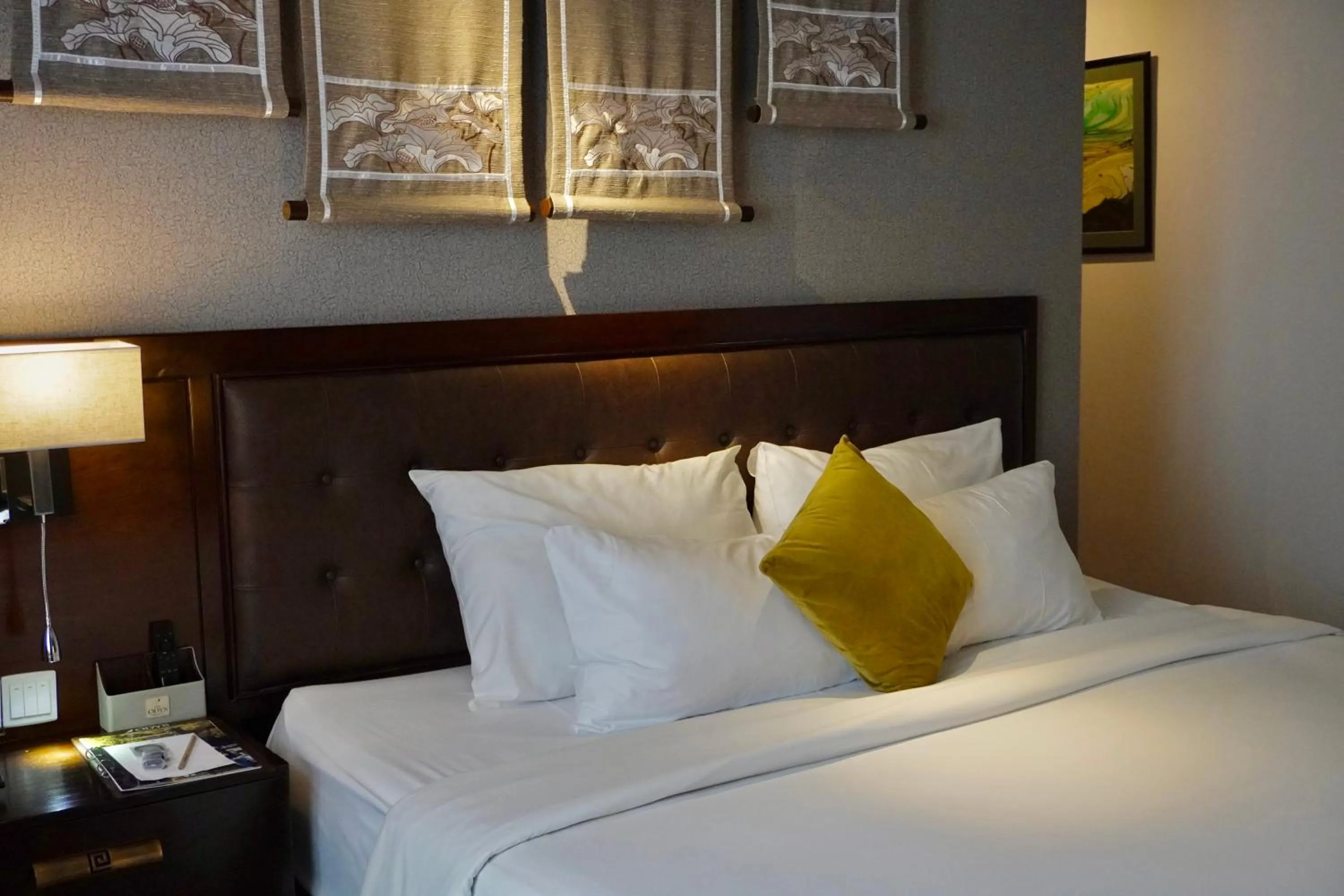 Bed in The Odys Boutique Hotel