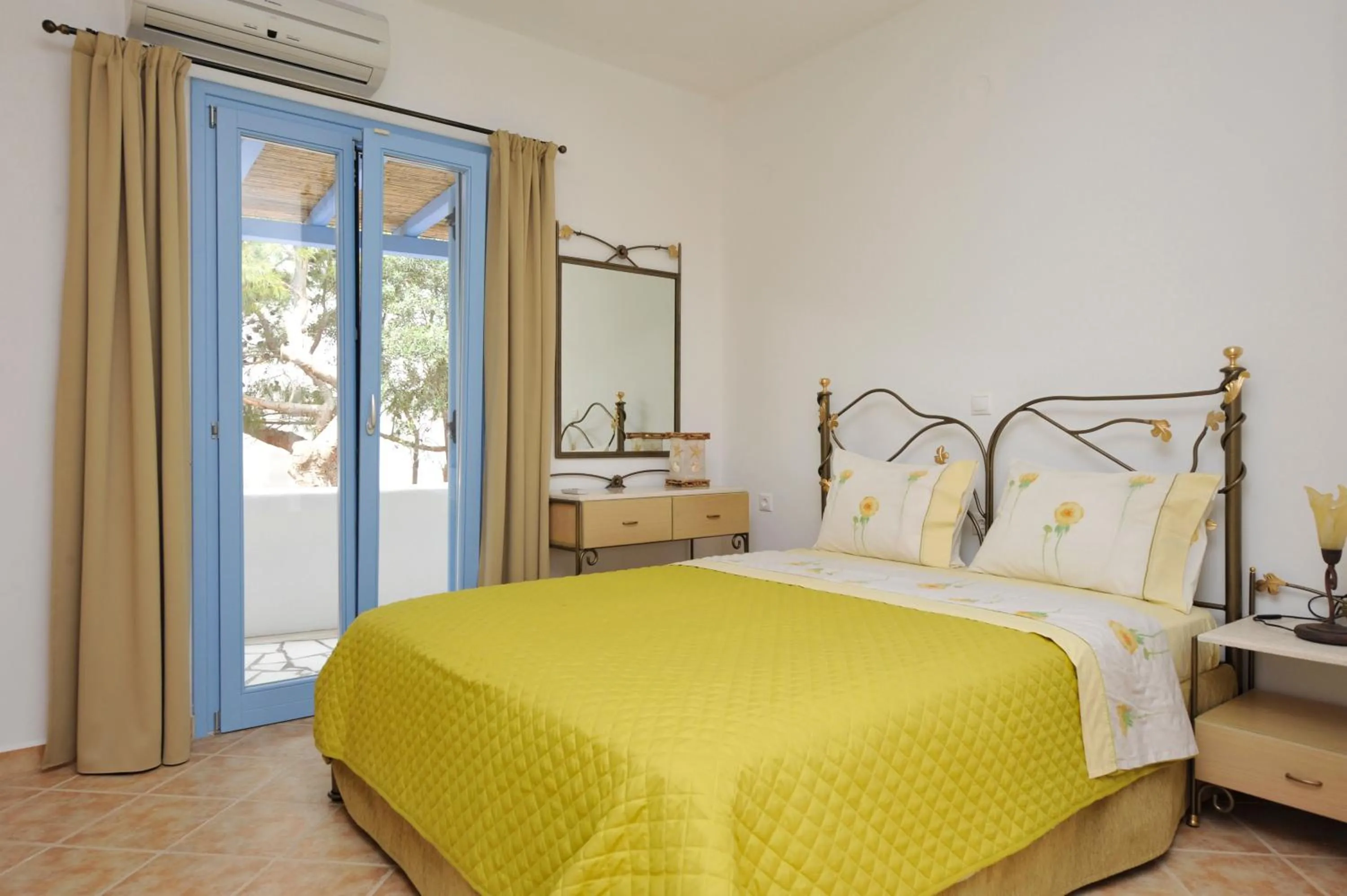 Bed in Evita Apartments