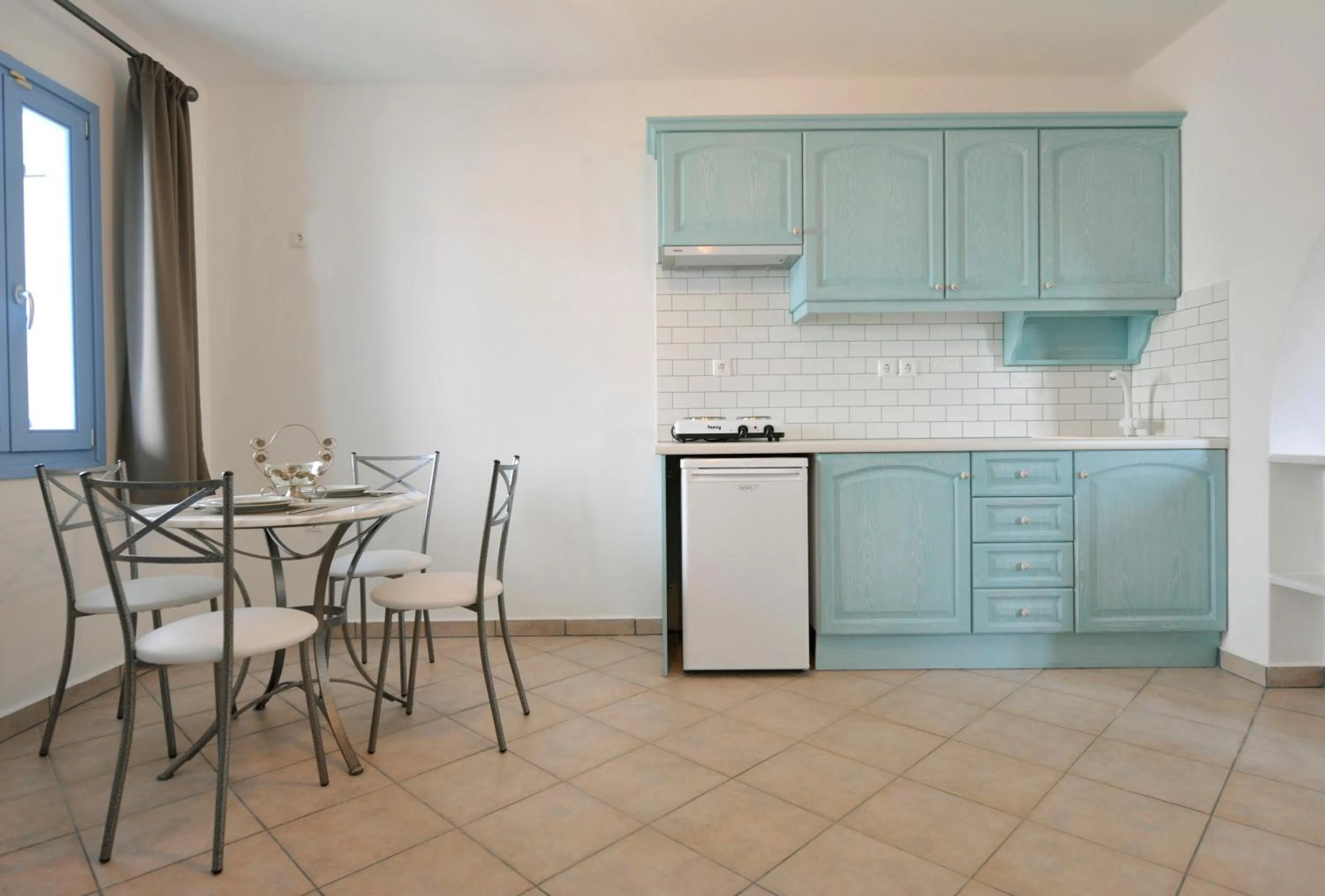 Kitchen or kitchenette in Evita Apartments