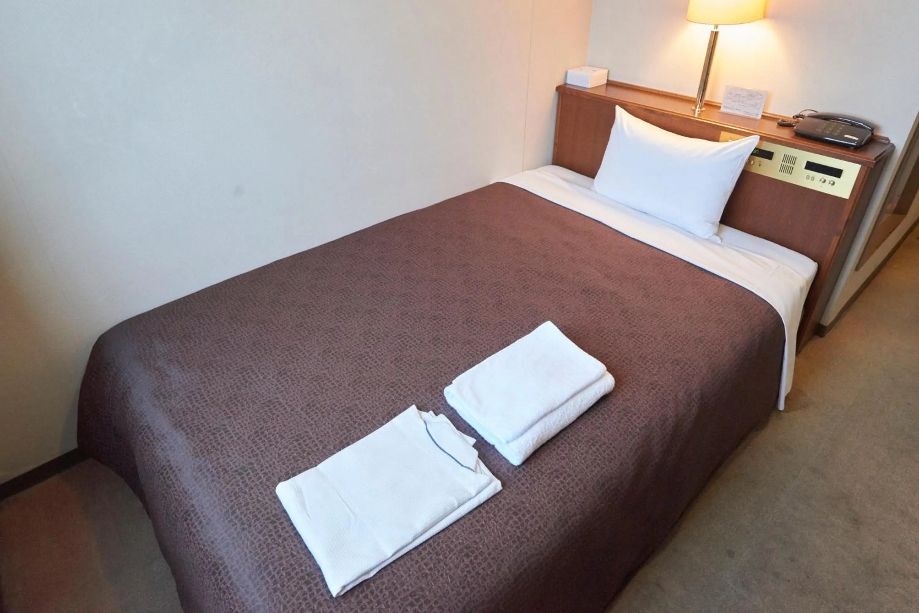 Photo of the whole room, Bed in Select Inn Mishima