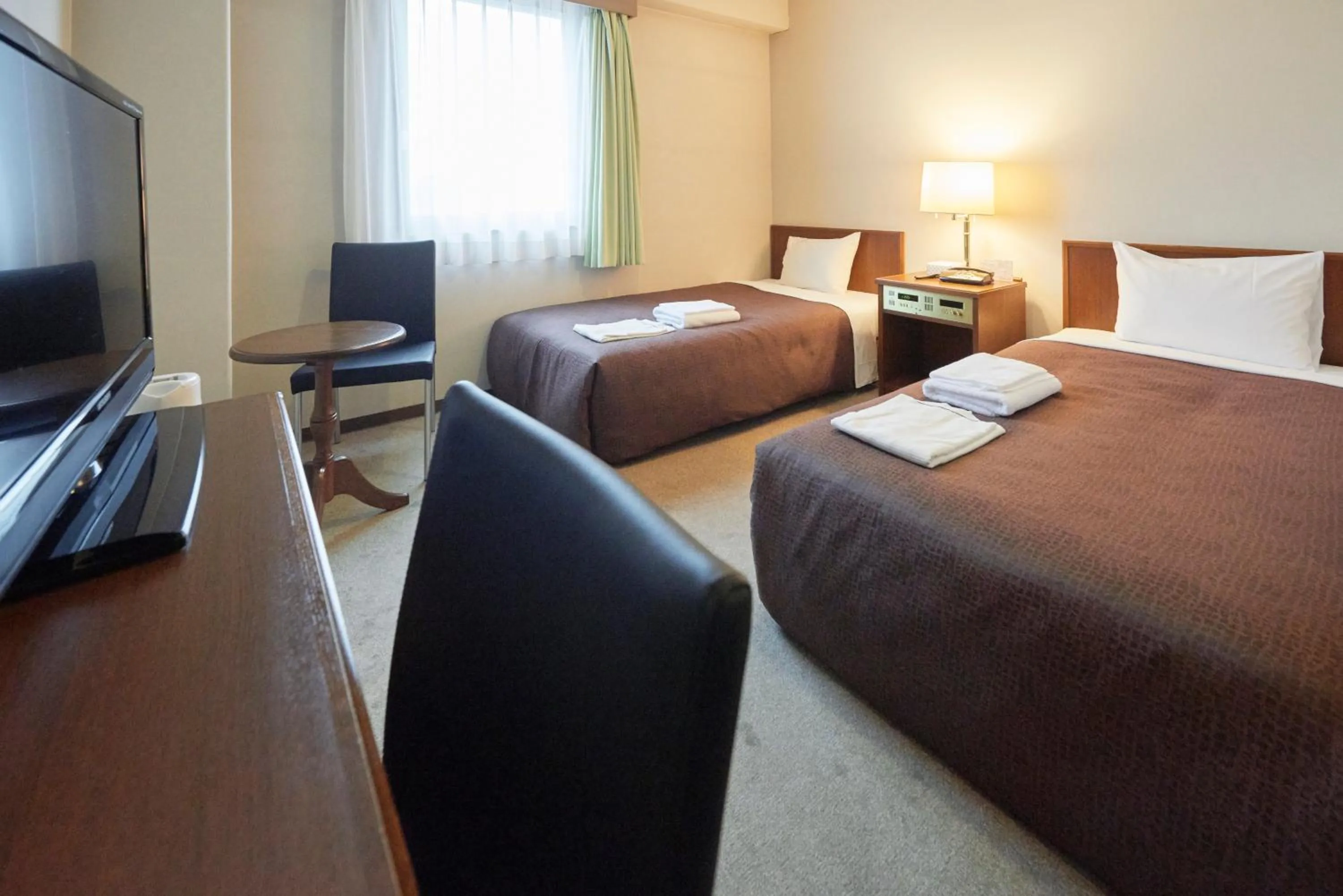 Photo of the whole room, Bed in Select Inn Mishima