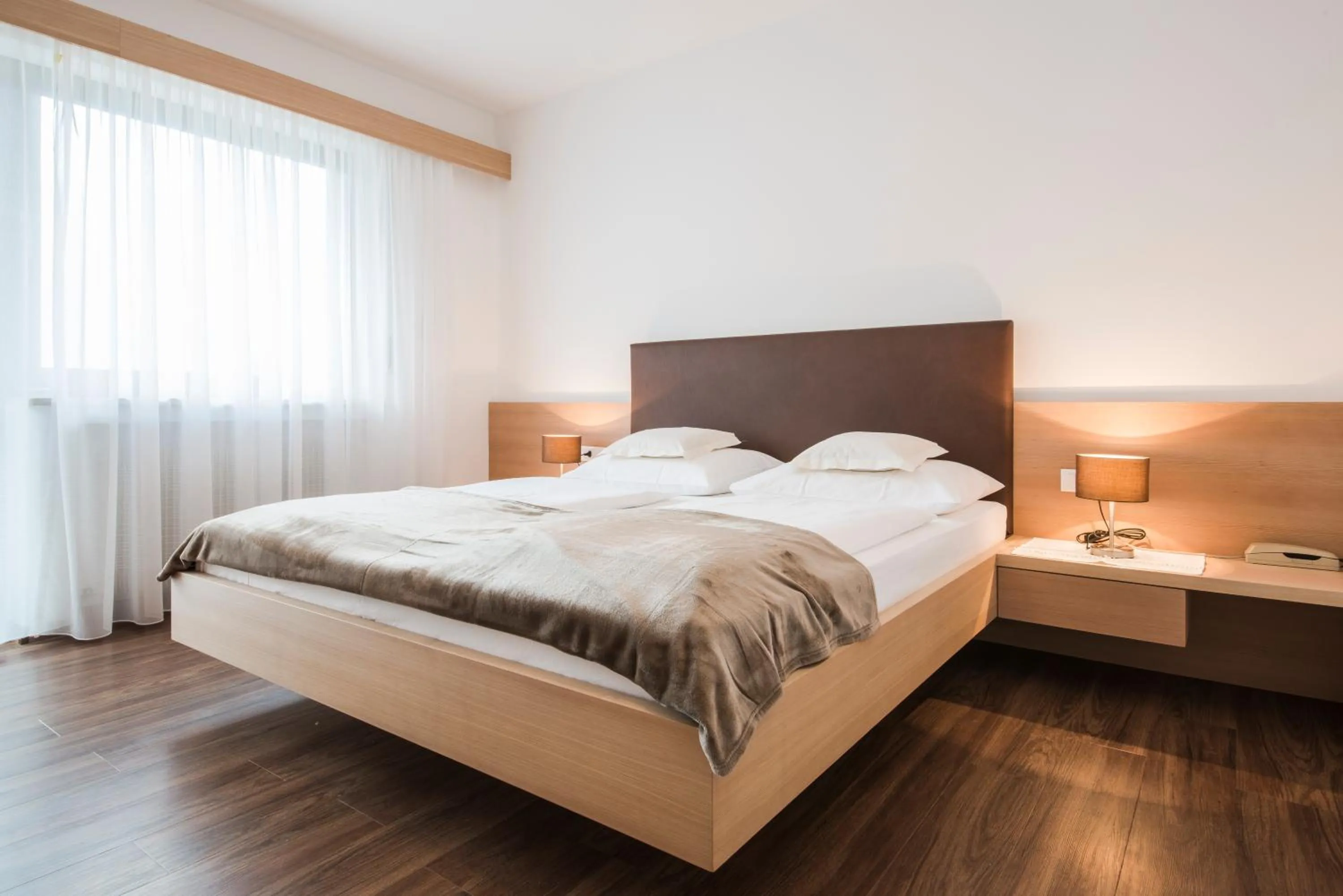 Bed in Heidi & Edith Family Aparthotel