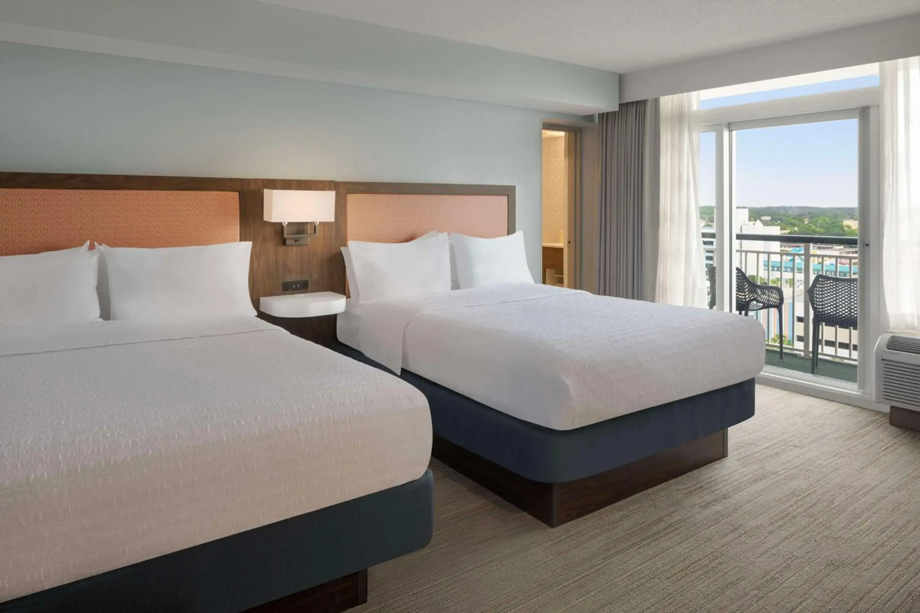 View (from property/room), Bed in Hampton Inn & Suites Myrtle Beach Oceanfront View (from property/room), Bed in Hampton Inn & Suites Myrtle Beach Oceanfront