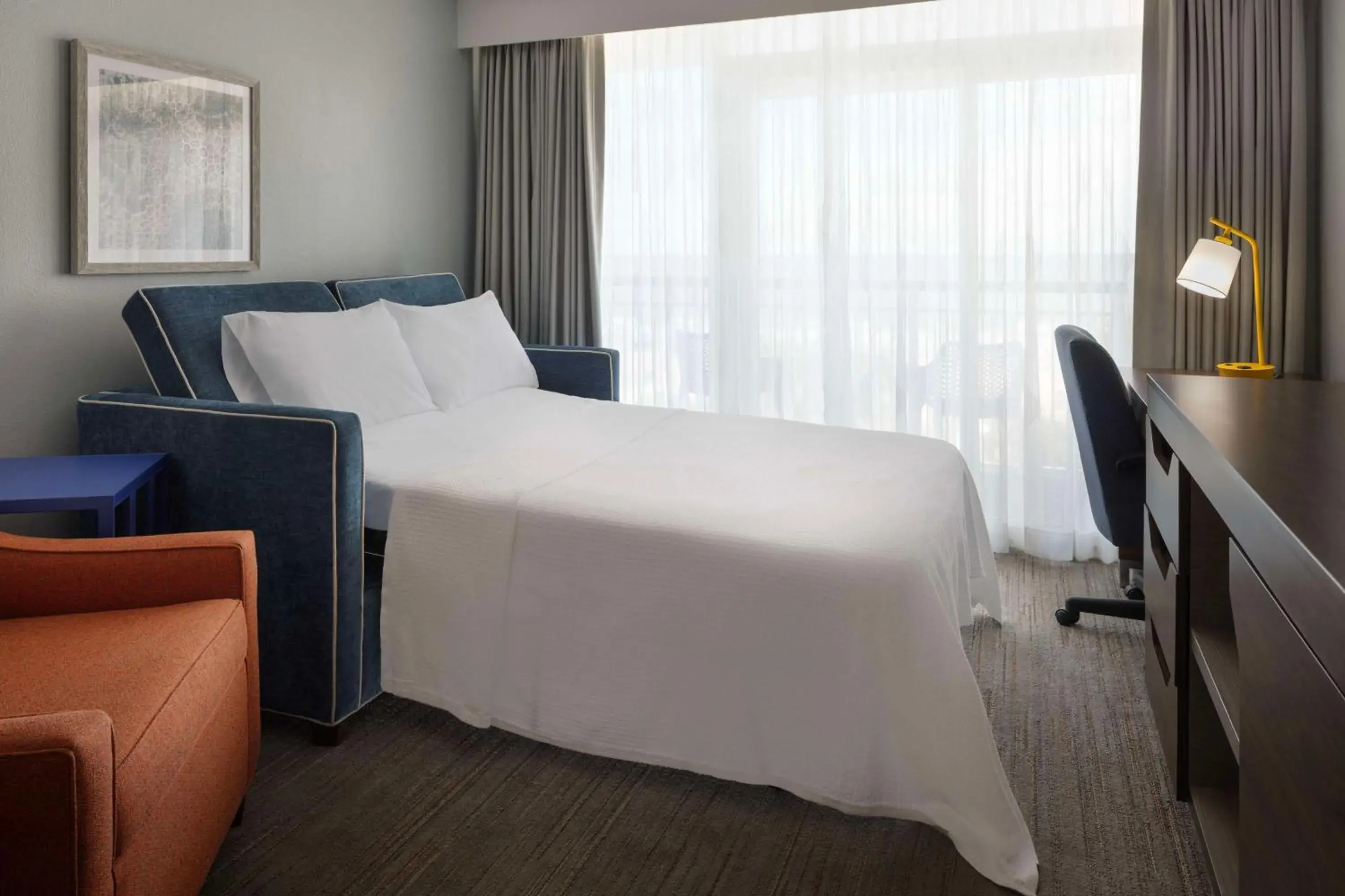 Living room, Bed in Hampton Inn & Suites Myrtle Beach Oceanfront Living room, Bed in Hampton Inn & Suites Myrtle Beach Oceanfront