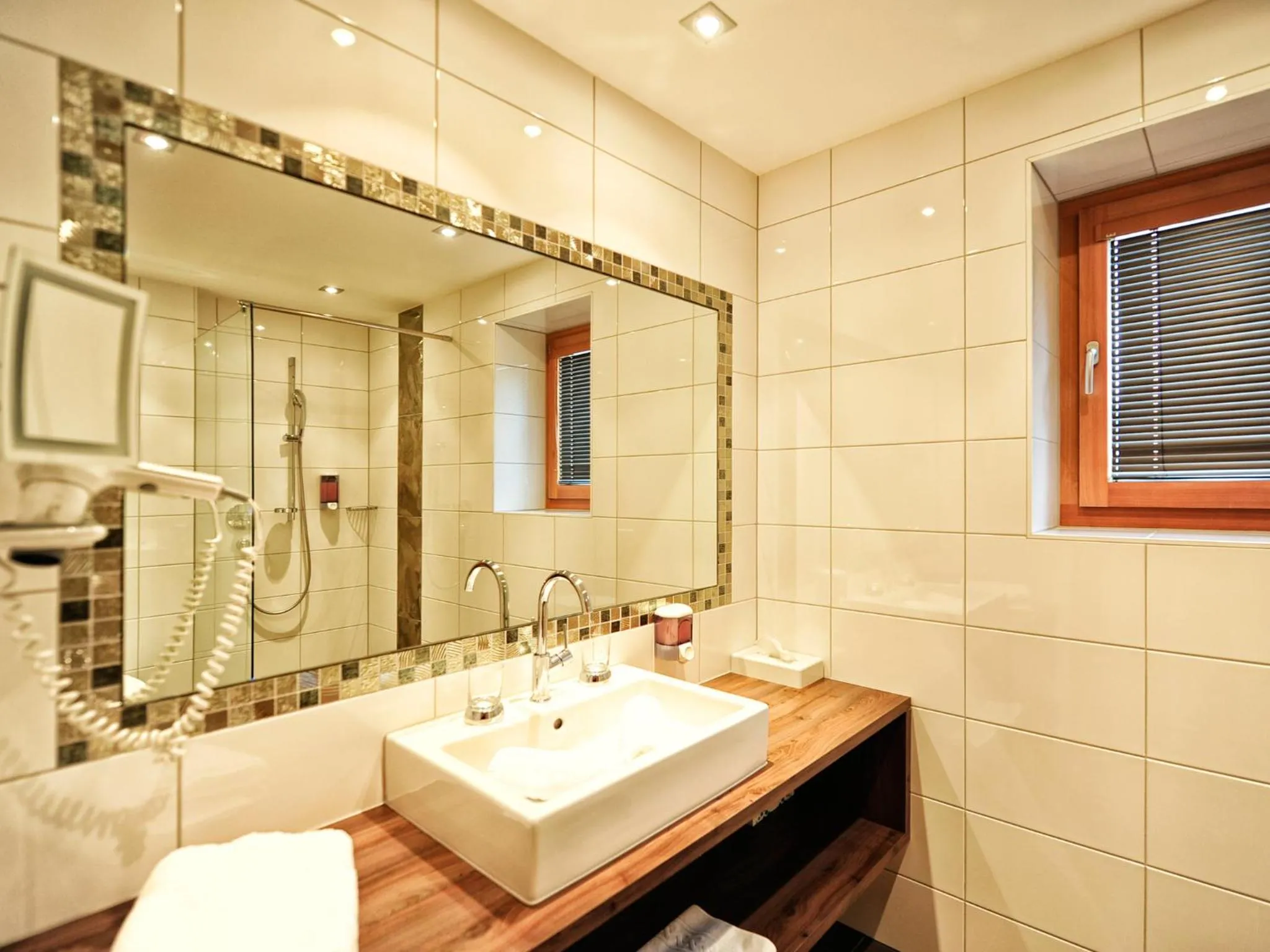 Bathroom in Hotel Garni Alpenland