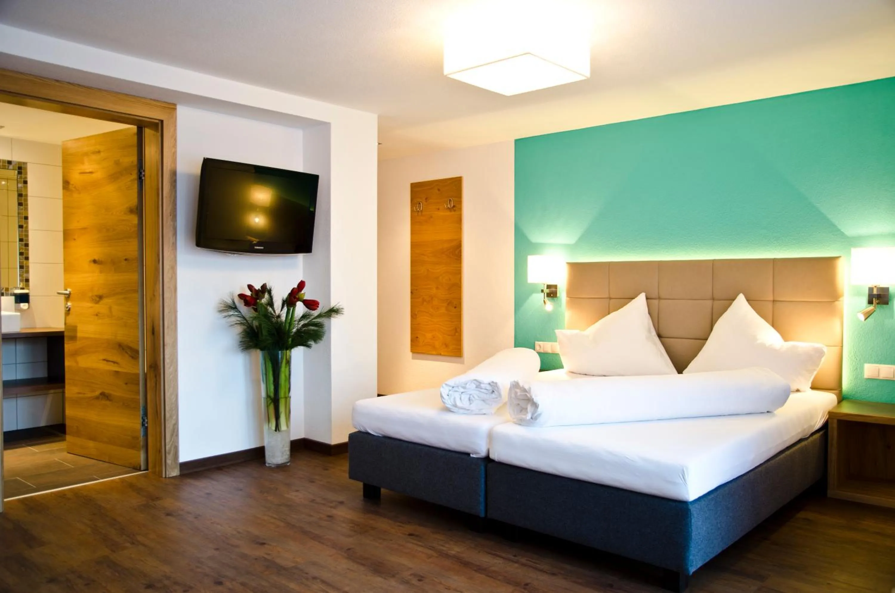 Bed in Hotel Garni Alpenland